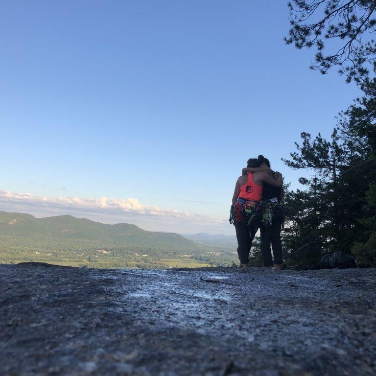 At the top of an all-day rock climb on White Horse Ledge in North Conway, NH in August 2019. One of the best, most exciting, most gratifying days we've had together!