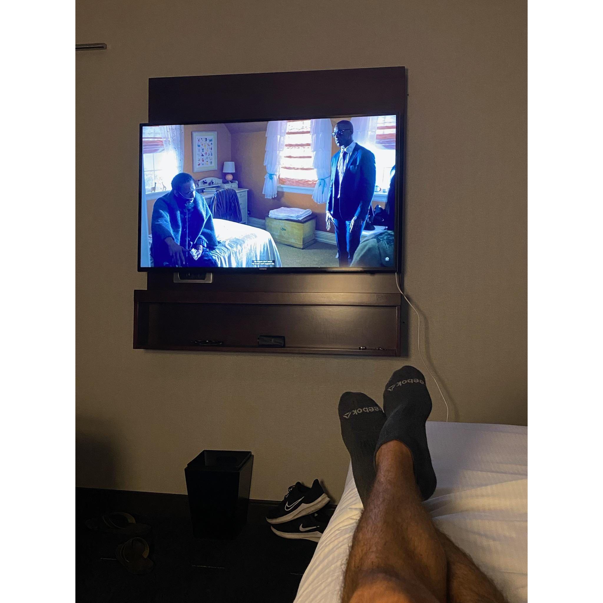 Michael watching 'This Is Us' with the familia while en route to Seattle, Washington as part of his graduation celebration. Genesis suggested the show to him; he now has an honorary degree in dadness.