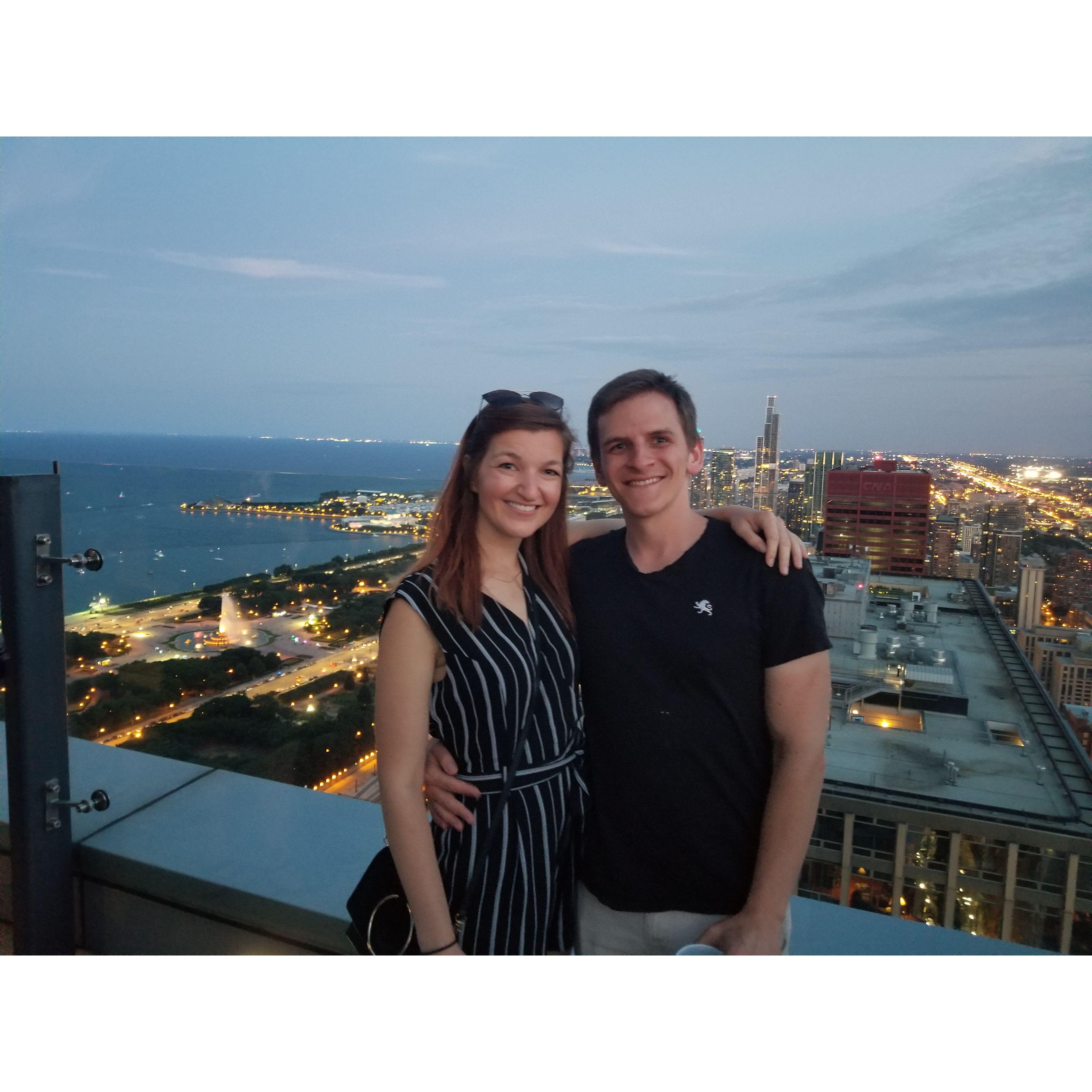 Overlooking the city skyline at our best friend's roof.