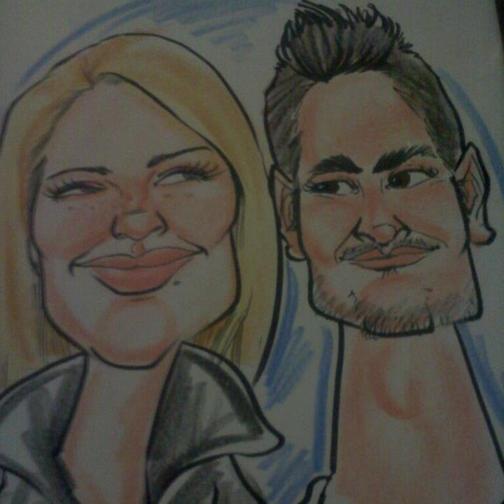 Busch Gardens for Adam's graduation present. Busch Garden's artist drew us as cartoon characters.