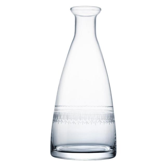 A Table Carafe With Ovals Design