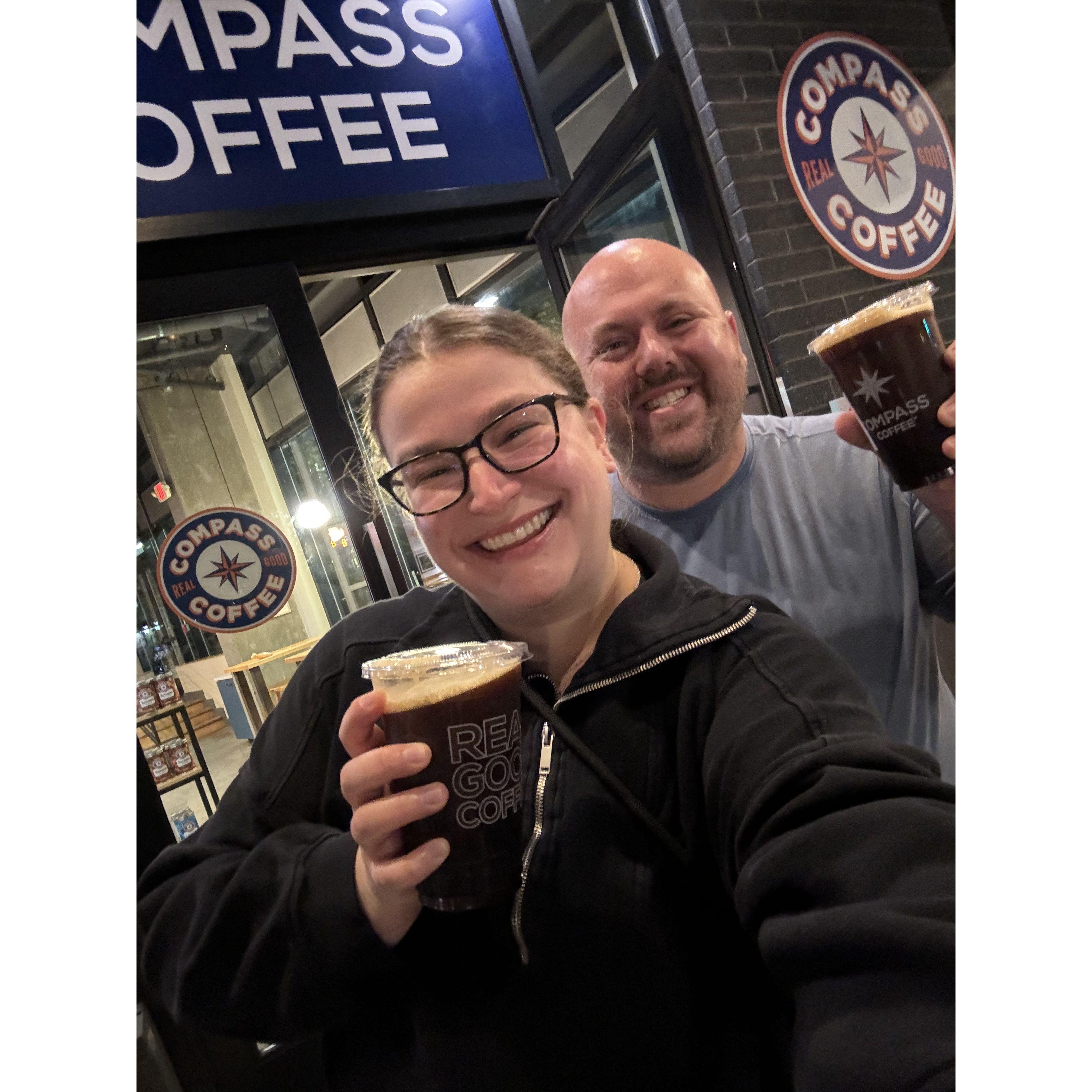 The very first customers at the new Compass Coffee location.