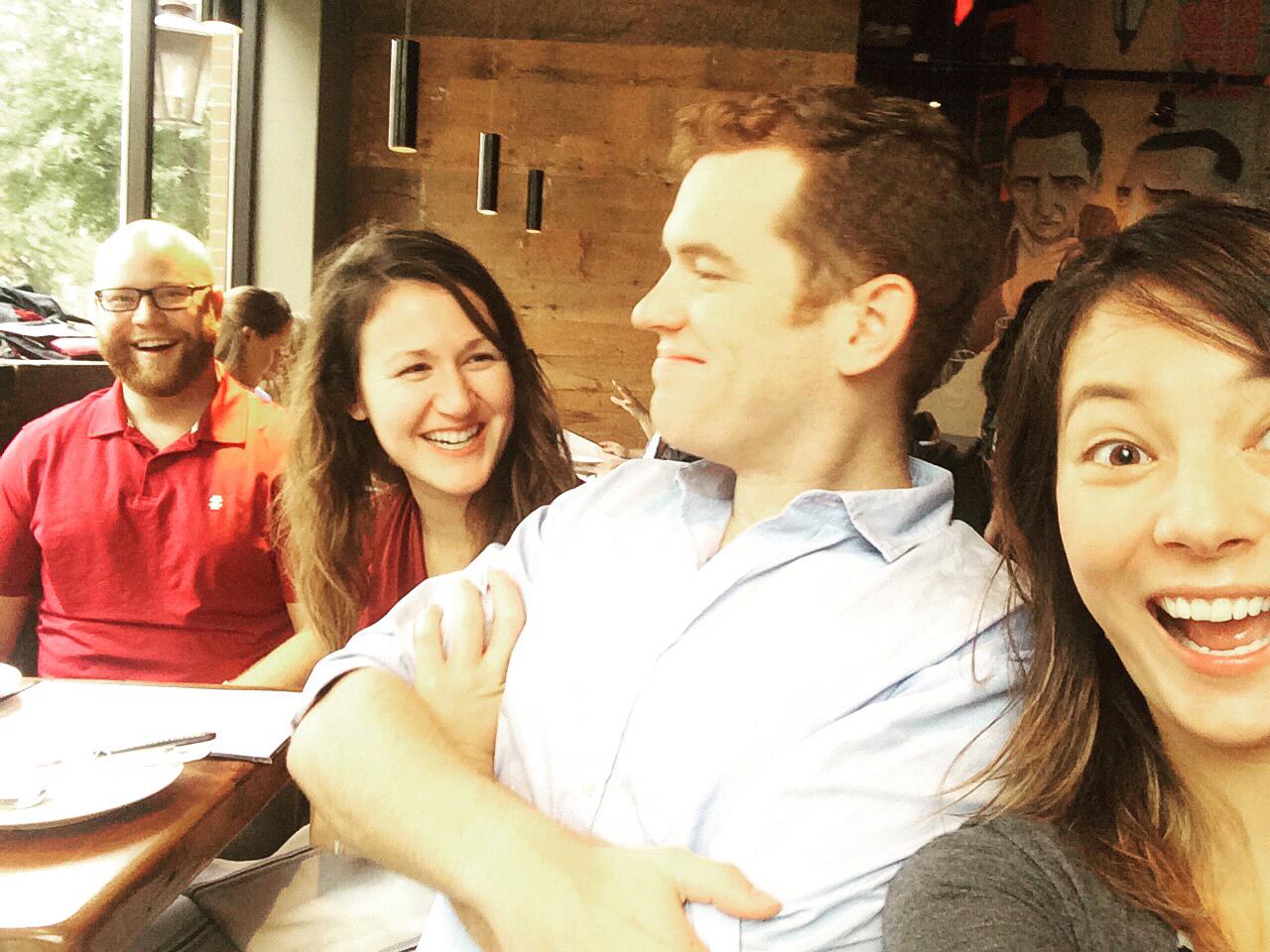 Travis was cranky at brunch and everyone was cheering him up.