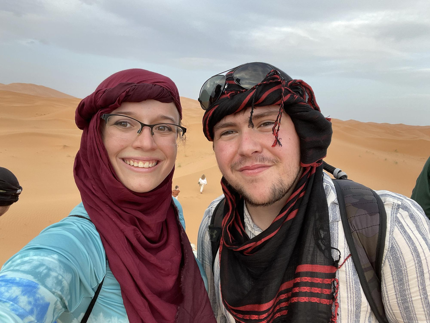 Riding camels in the Sahara