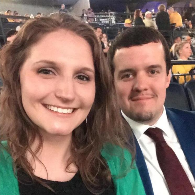 Callie's first Preds game after walking at least a mile in the pouring rain.