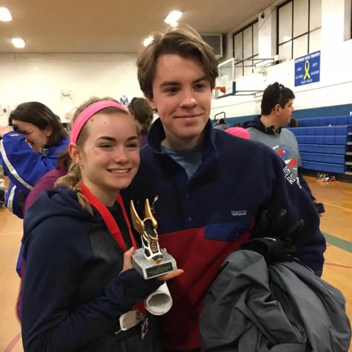 Jake supporting Jennie at her first half marathon! Little did they know what would become of her running journey... 2016