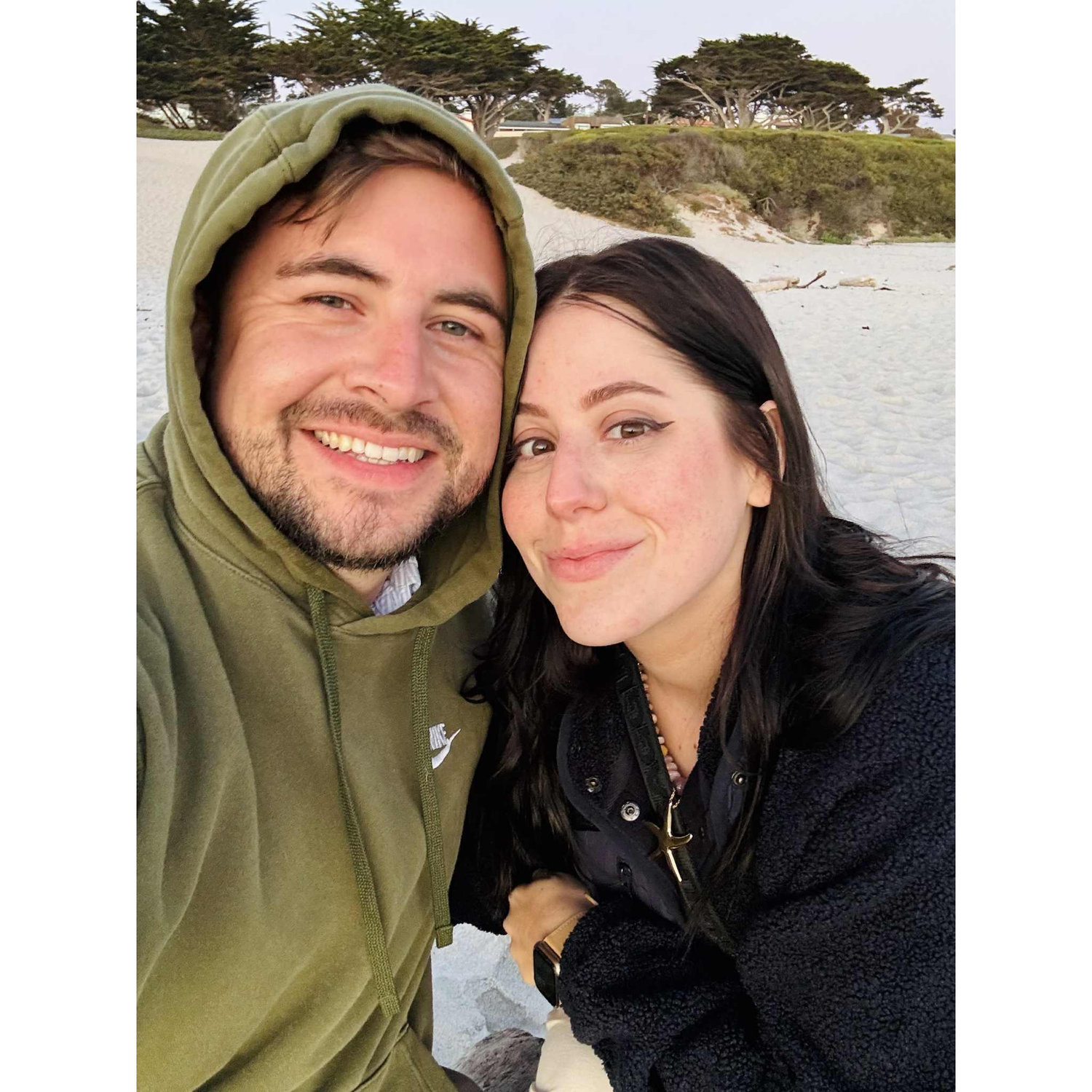 Christina and Caleb on their engagement trip to Big Sur. This was the night before their engagement on Carmel Beach in Carmel, California.
