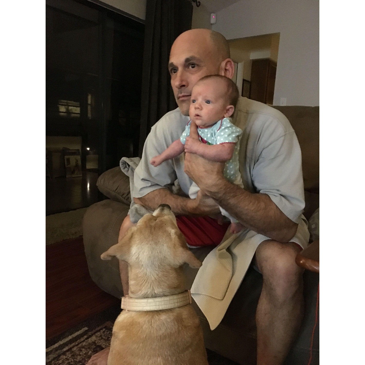 The amazing Papa with Kaia - and the ever watchful Sasha