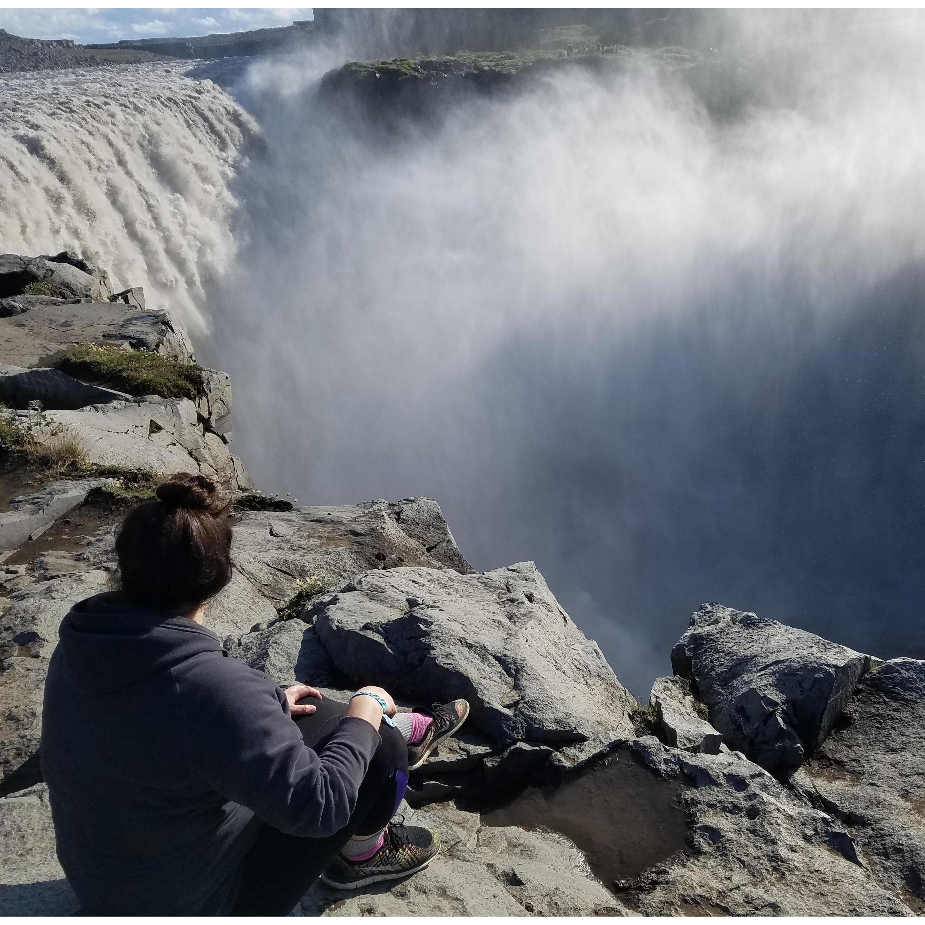 Erika sitting at the Great Dettifoss. Iceland 2018.