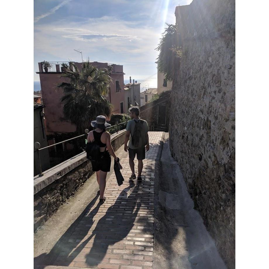 Elizabeth and Bahram hiking between towns on the coast of Italy