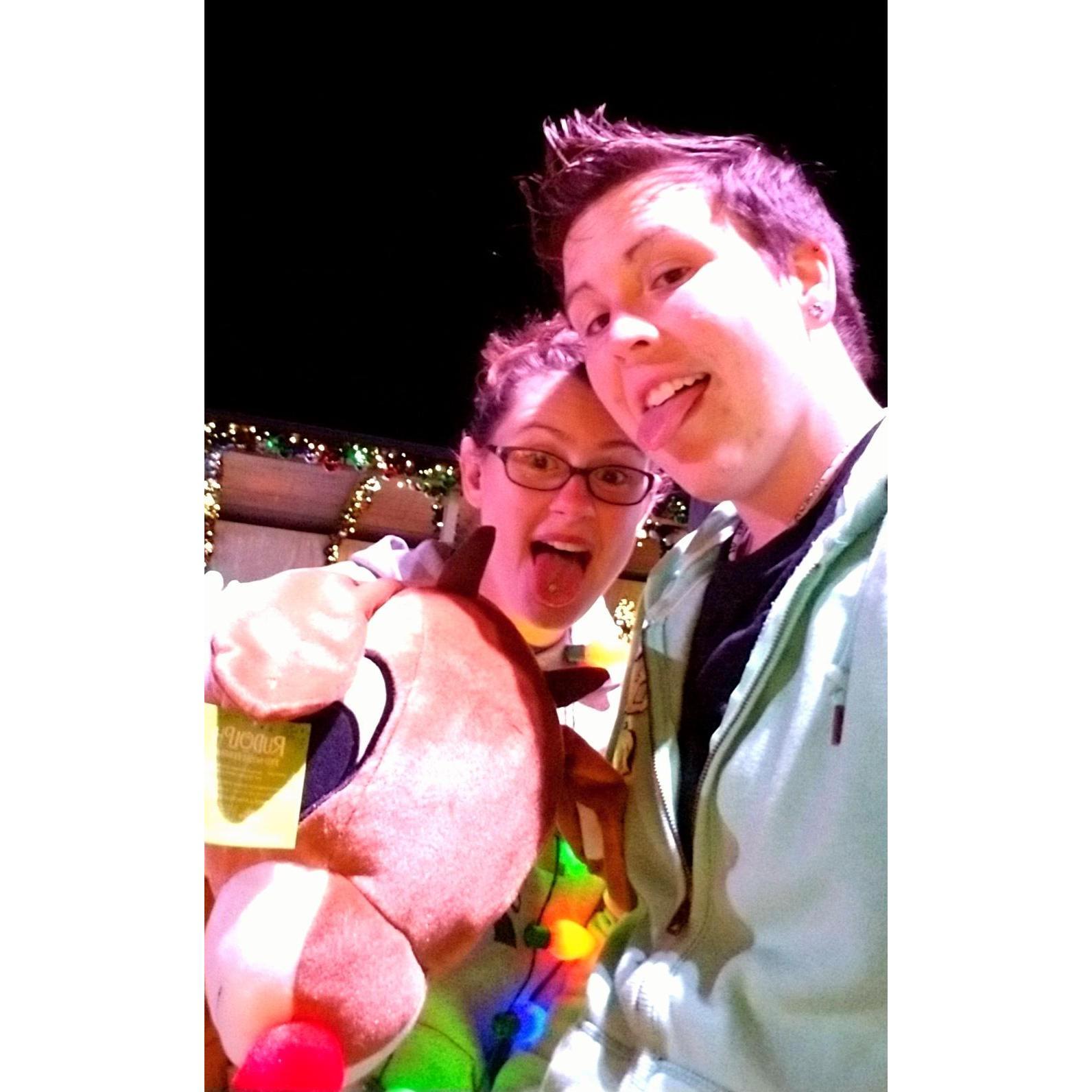 Showing off my bball skills winning her a giant Rudolph