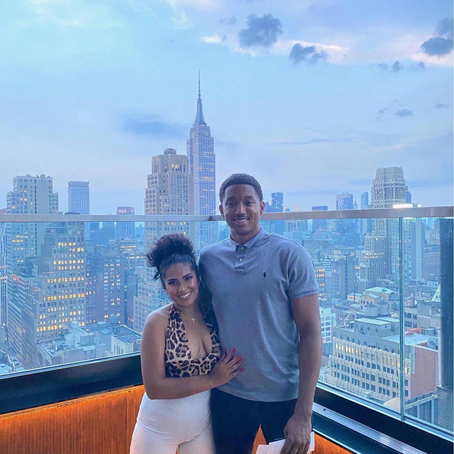 Enjoying the sunset at one of the highest rooftop bars in NYC - August 2021.