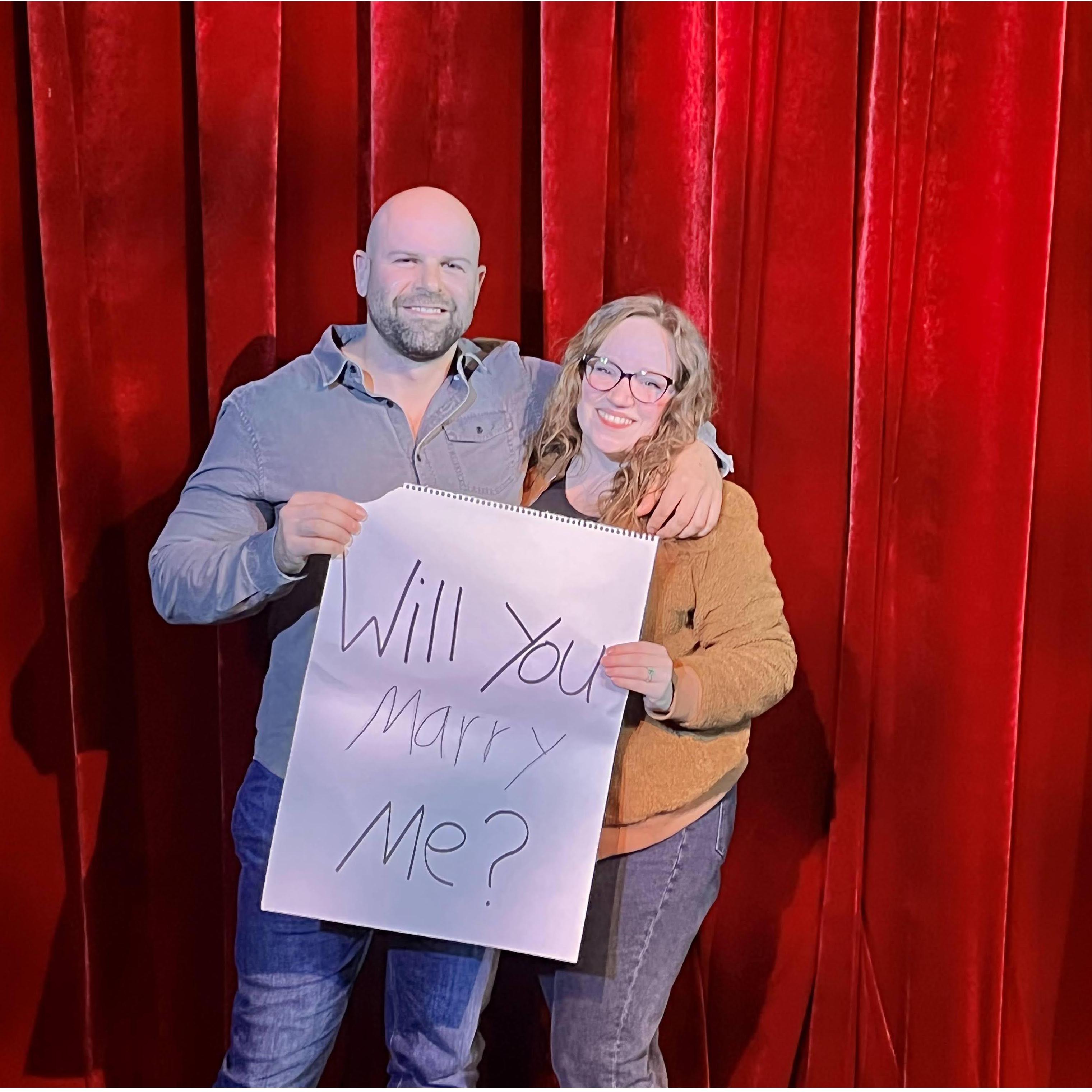 Picture on stage post-proposal at the Chicago Magic Lounge.