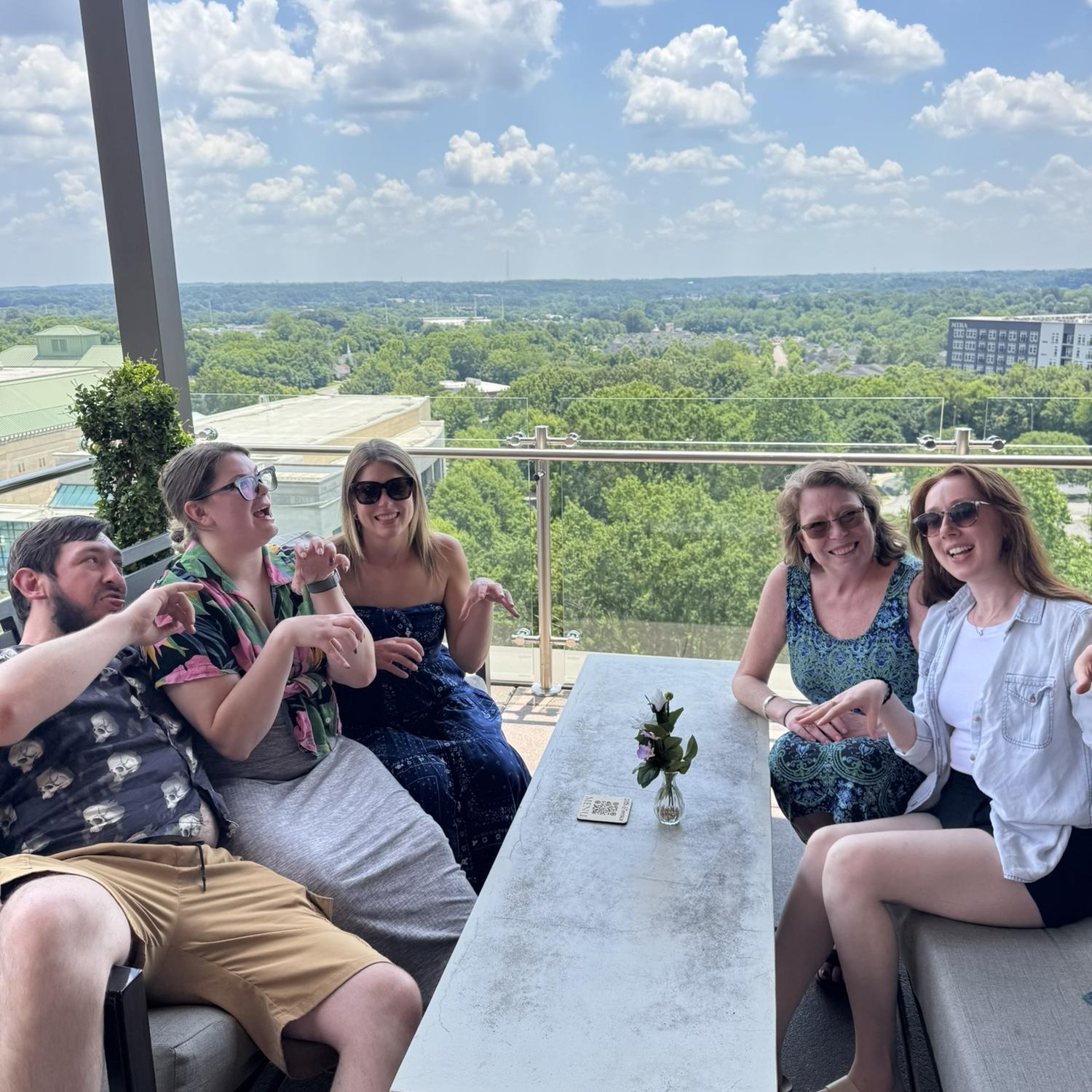 Enjoying an evening at a rooftop bar in downtown Raleigh.