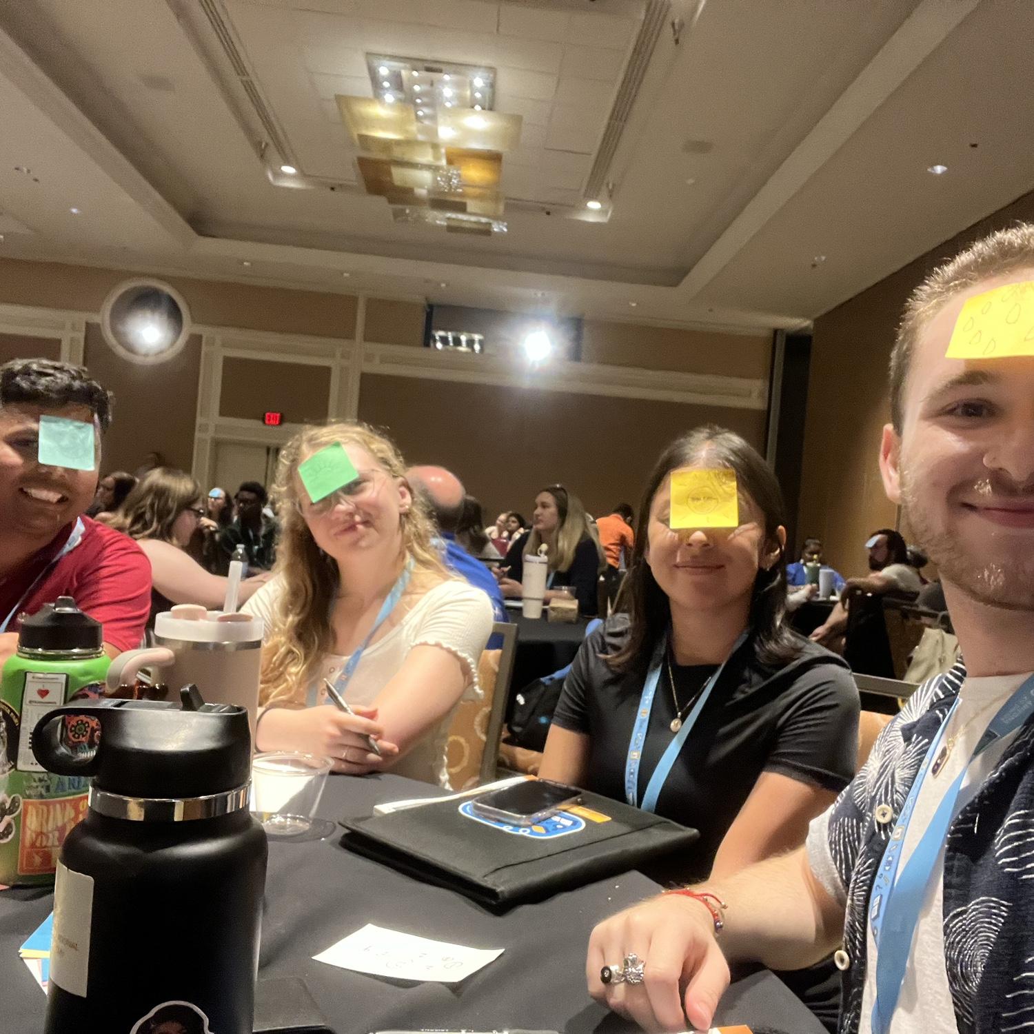 Madi at a teacher conference in Tucson with her teacher friends Ravi, Sara, and Cody.