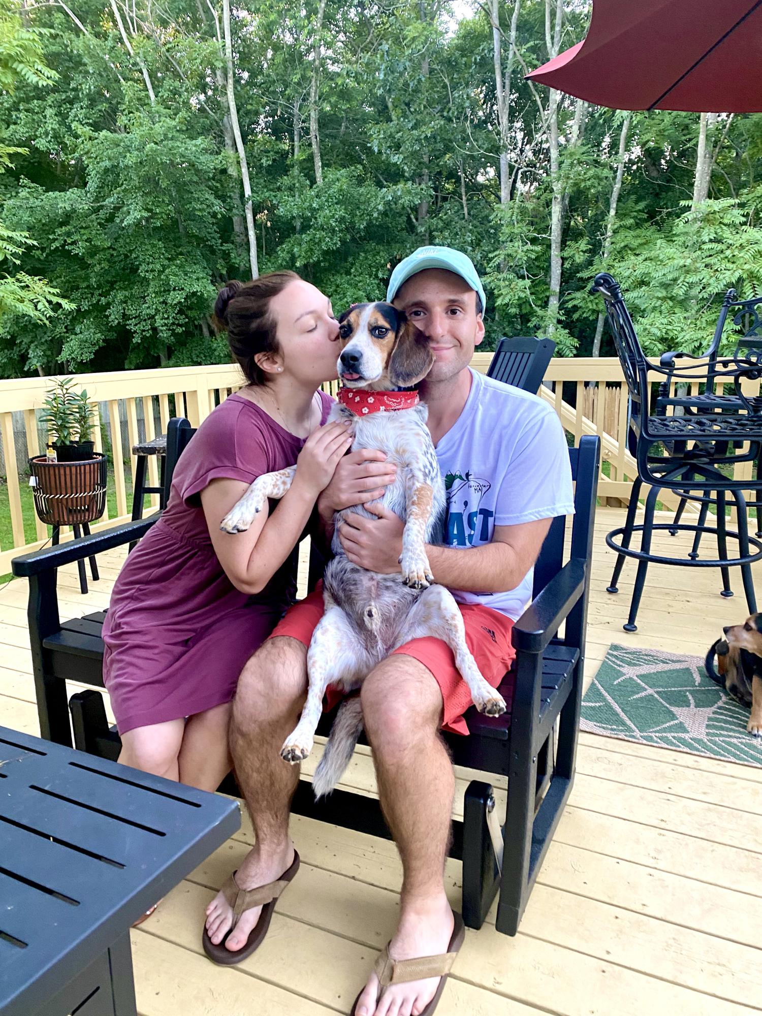 The couple have two dogs, Foggy (on Colin’s lap) and Misty, not wanting to be pictured in the corner.