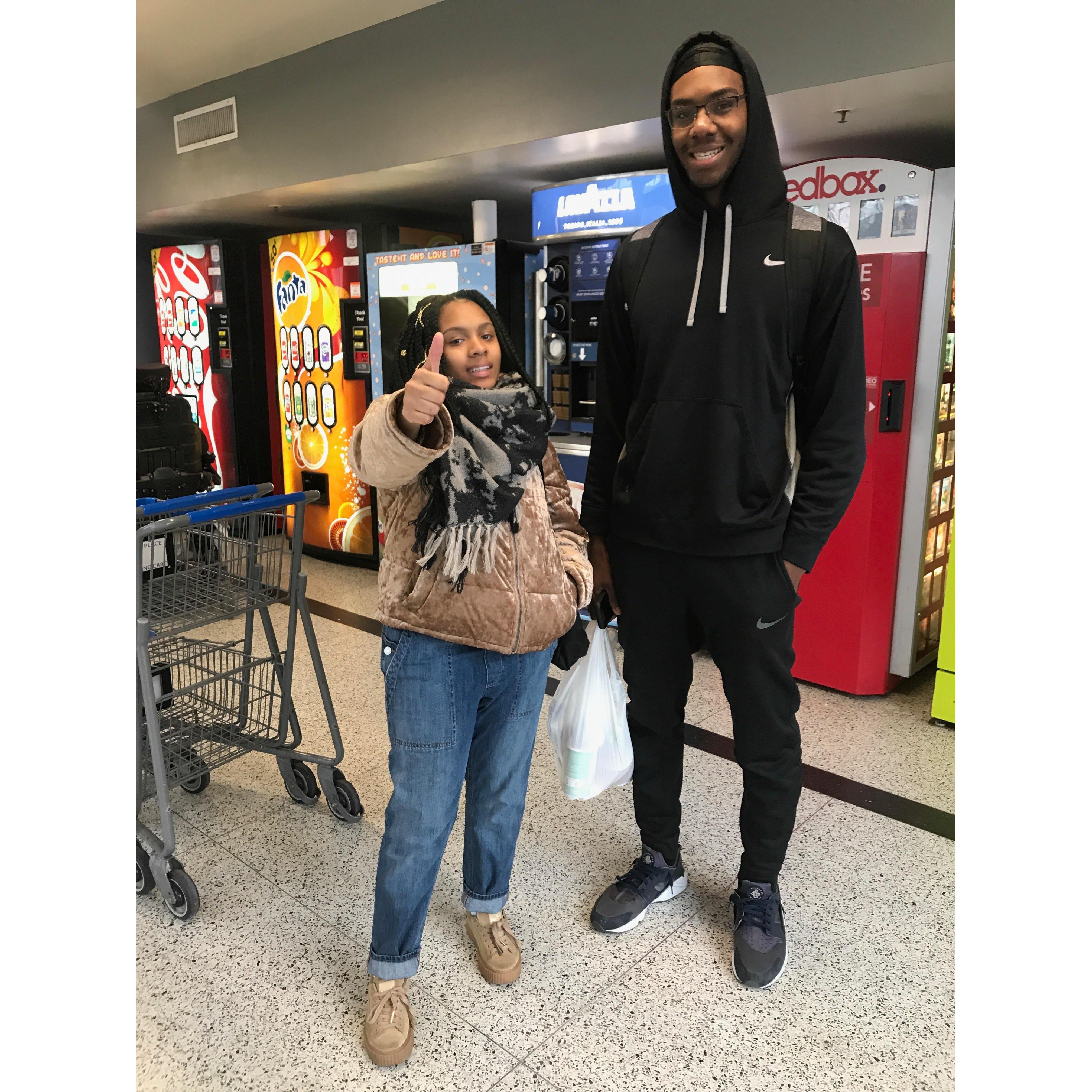 Our friend wanted to snap a pic of us after making a Walmart run like we were celebs