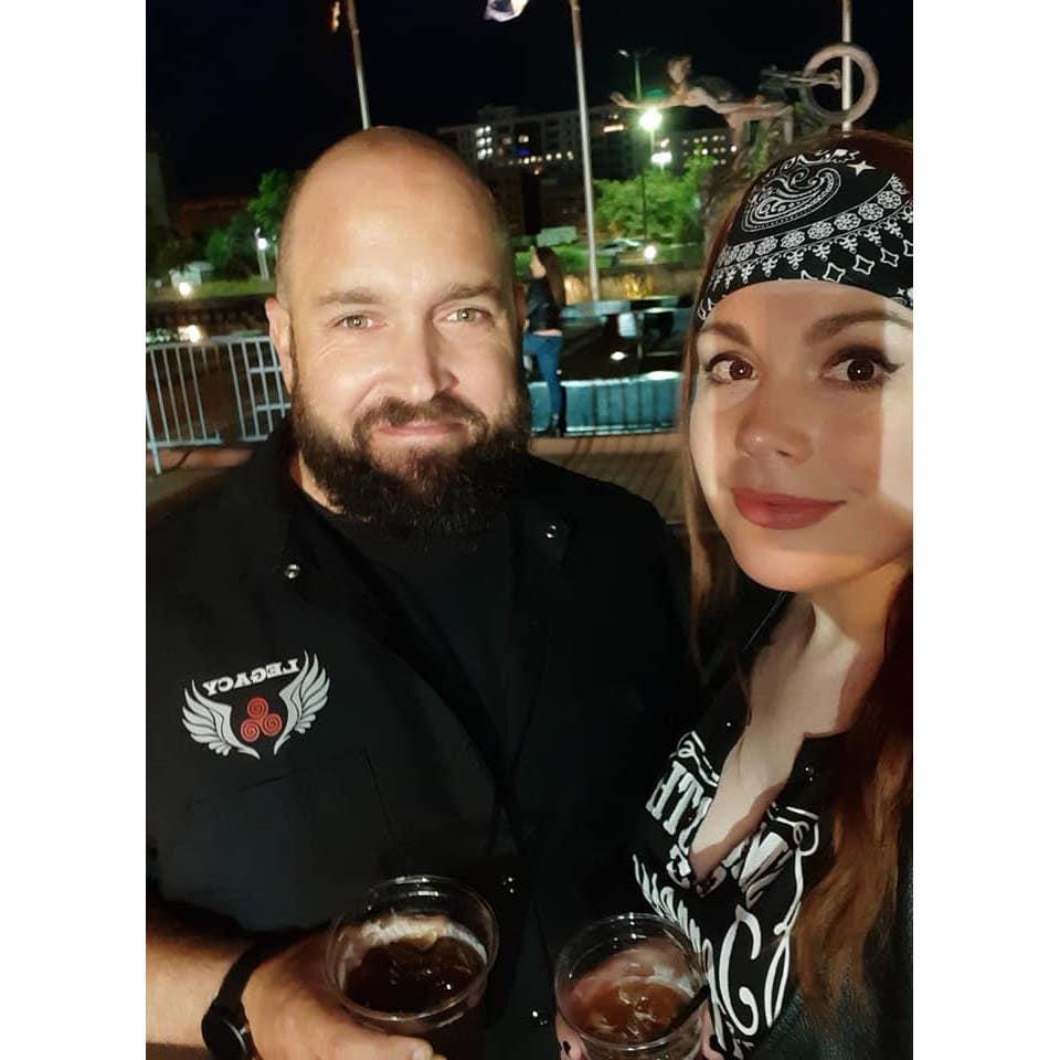 Our pose says, "Having a great time at a Harley event". Meanwhile, Becca's bandana says, "Welcome to the jungle".