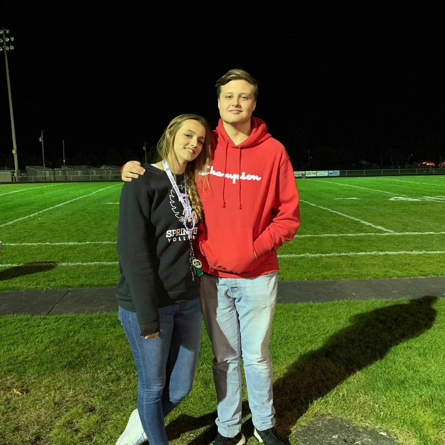 First picture together at a Football prep rally