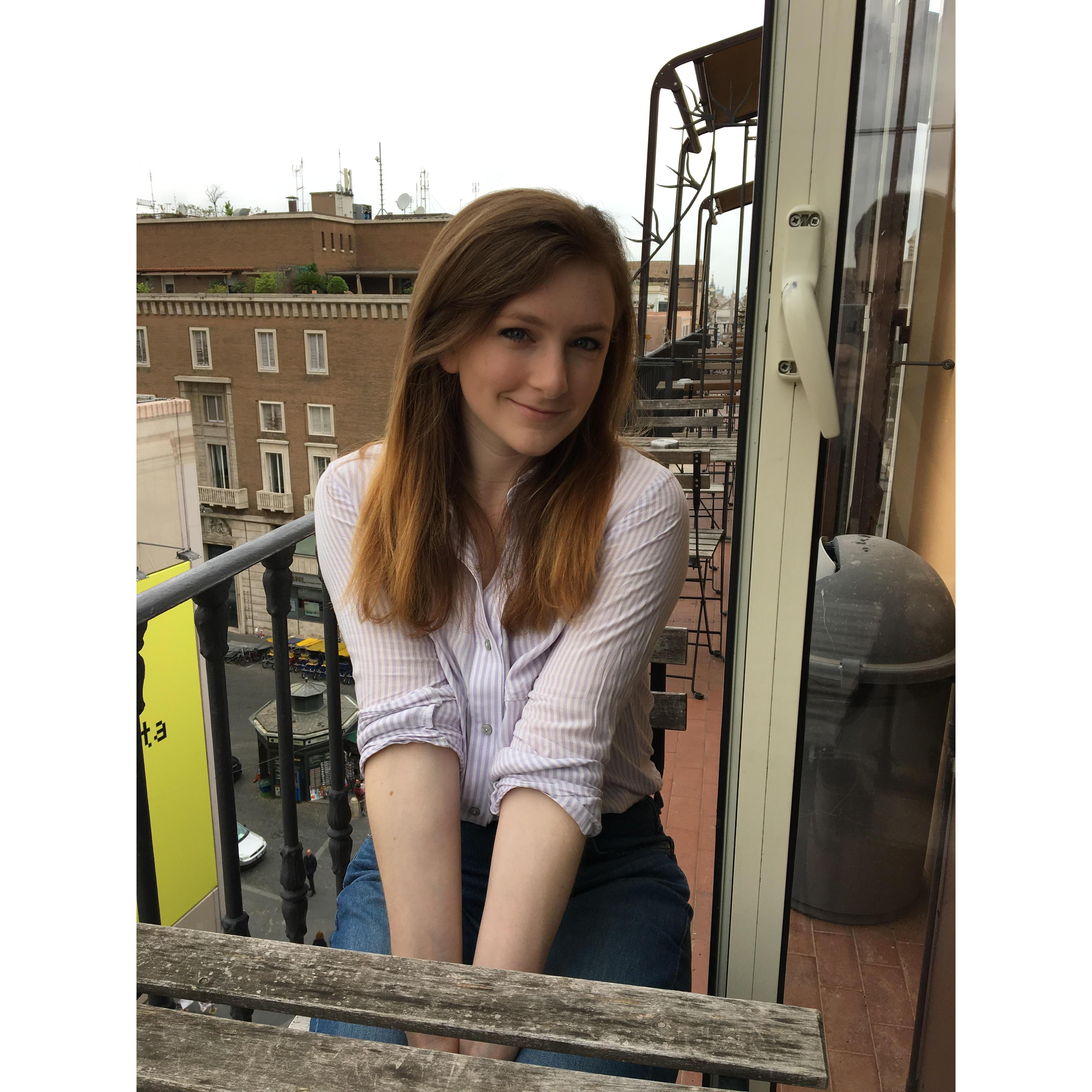 Trip Adventure: Rome, Italy. Look at how beautiful this girl is. Enjoying the views from our patio studio in Rome.