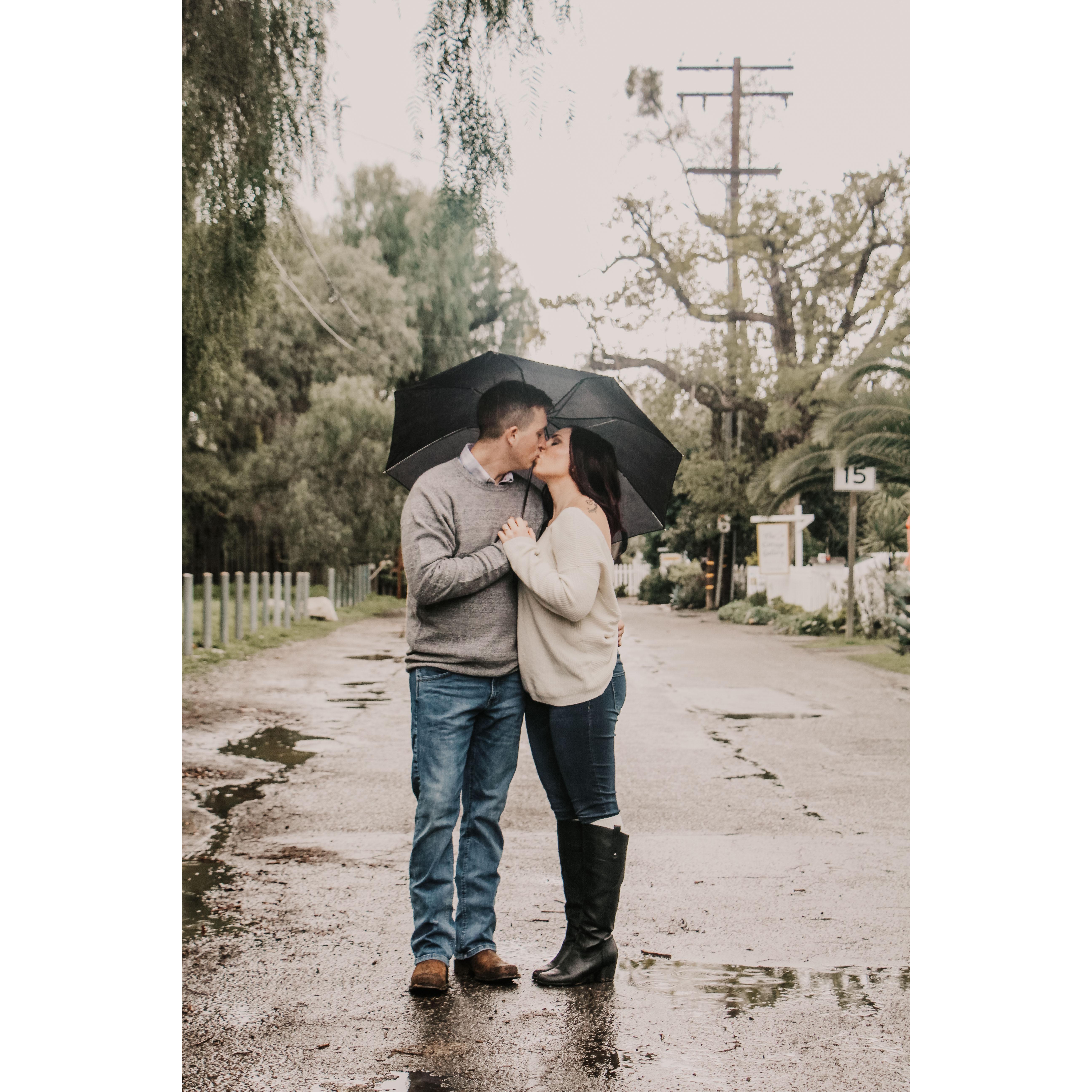 Rain on their engagement photo shoot day, could their be anymore luck than that?!