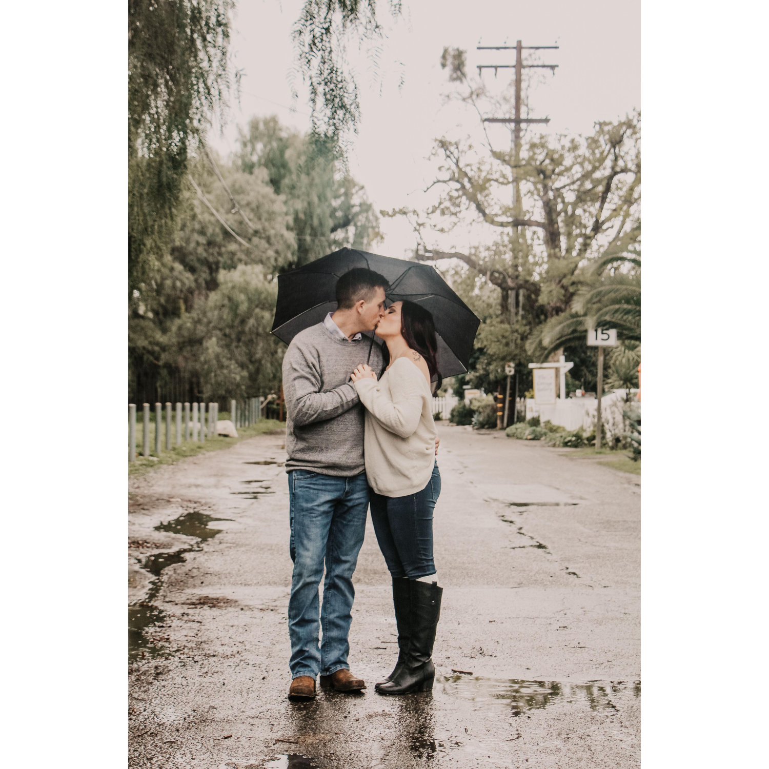 Rain on their engagement photo shoot day, could their be anymore luck than that?!