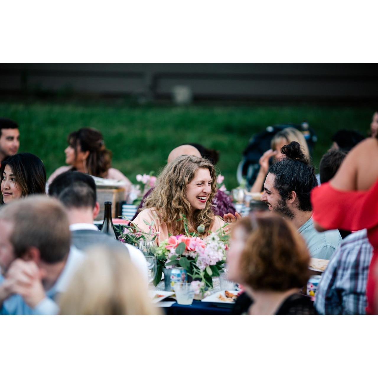 Caught giggling at a friend's wedding.