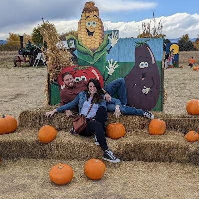 Picking pumpkins with friends.