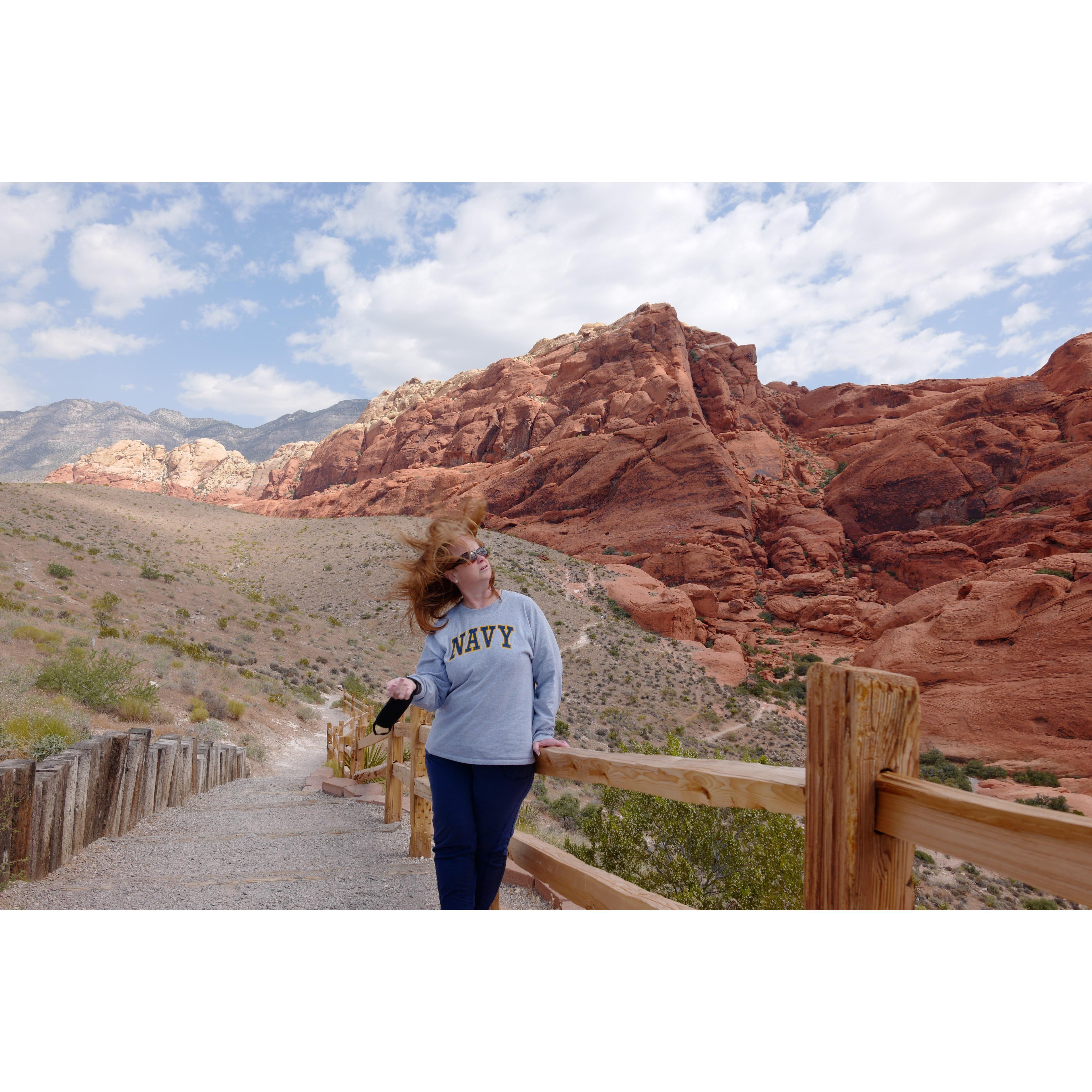 Monica letting her hair fly in Red Rock Park in Las Vegas in 2020.