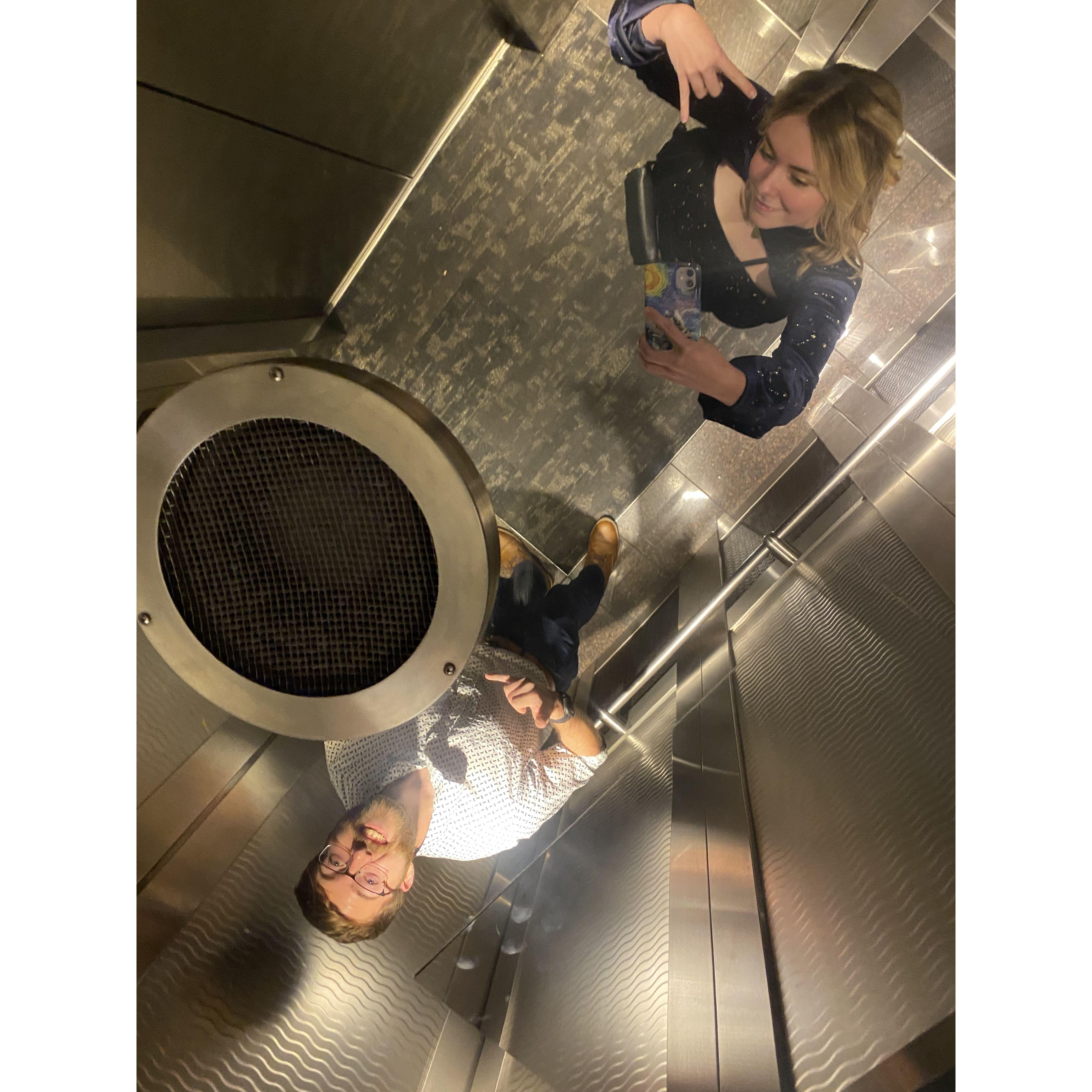 A really cool elevator in a very fancy restaurant