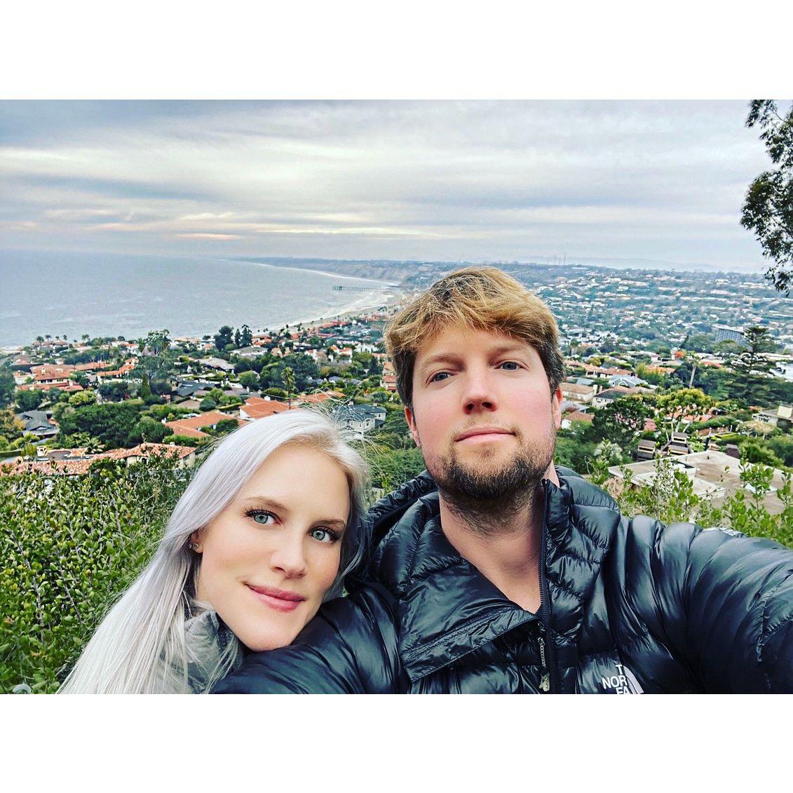 December 2021 - Our second Christmas Card Picture - Taken at our "scenic walking spot" that overlooks La Jolla Shores during one of our walks. This spot is also the place where Sean proposed!