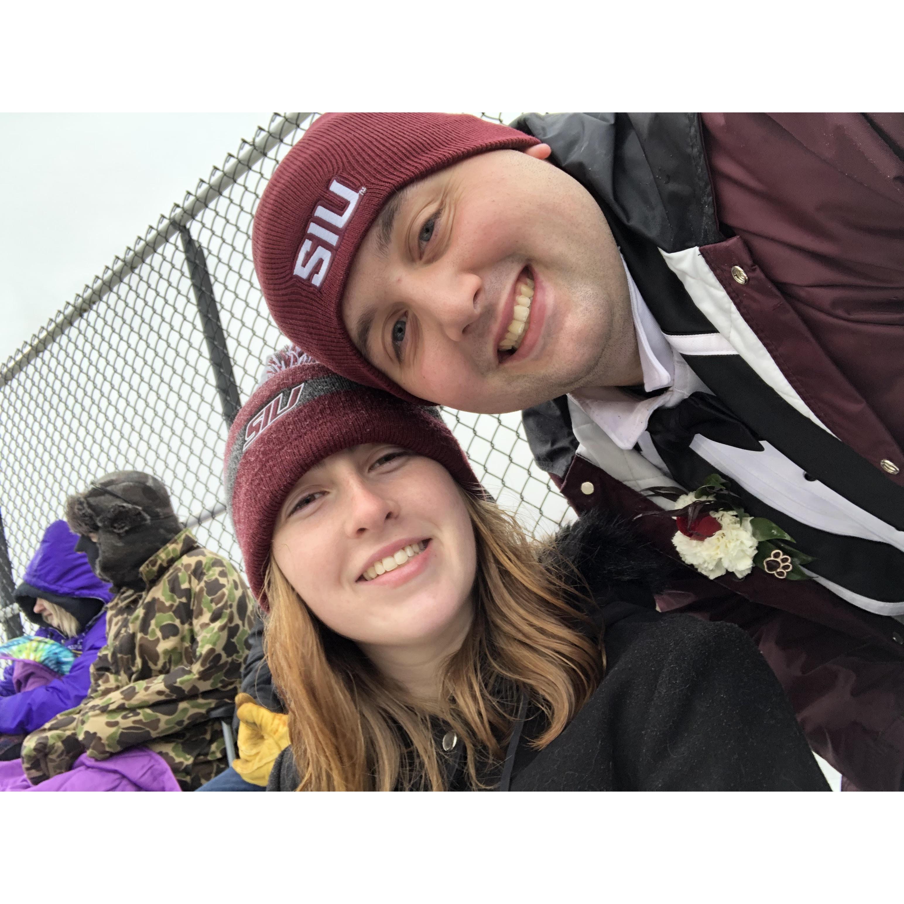 This is us celebrating Justin's final home football game and performance with the Marching Salukis.