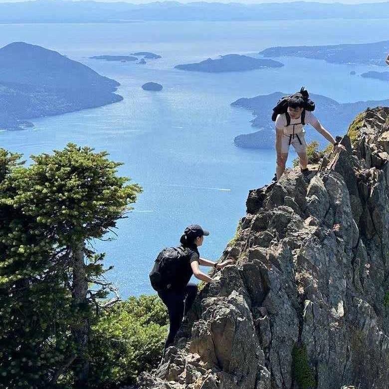 We love going on adventures together - here we are conquering Brunswick Mountain in British Columbia
