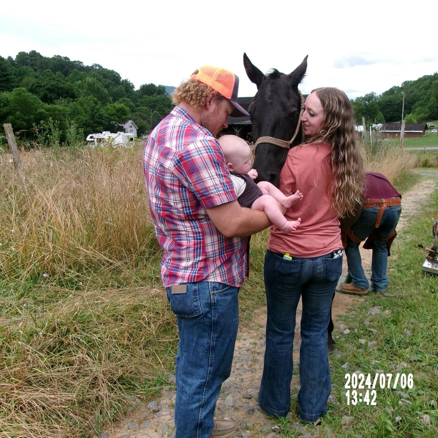 Enjoying time with the horses.