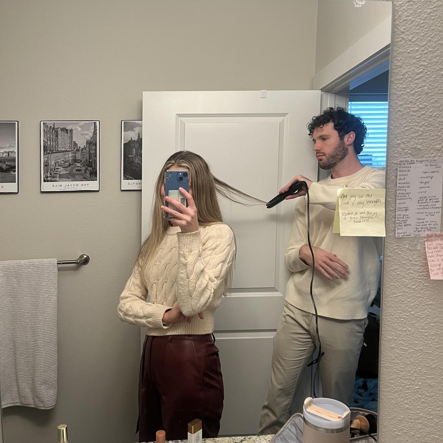 12/12/2024- Photo from Merrick helping MJ with her hair in her apartment in Springdale, Arkansas.