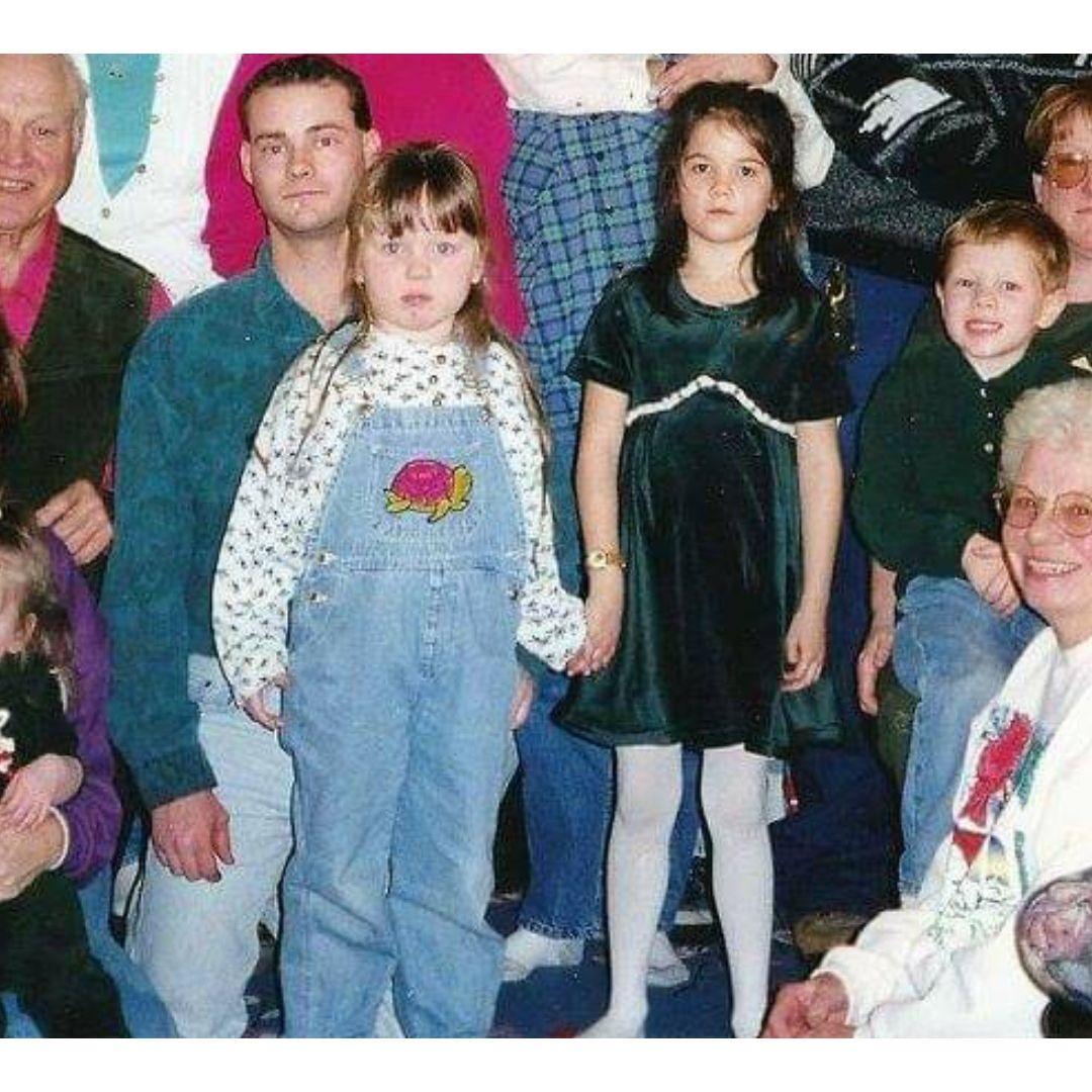 The bride in turtle overalls with her cousin Chaz.(Giving "The Shining" come play with us-realness)