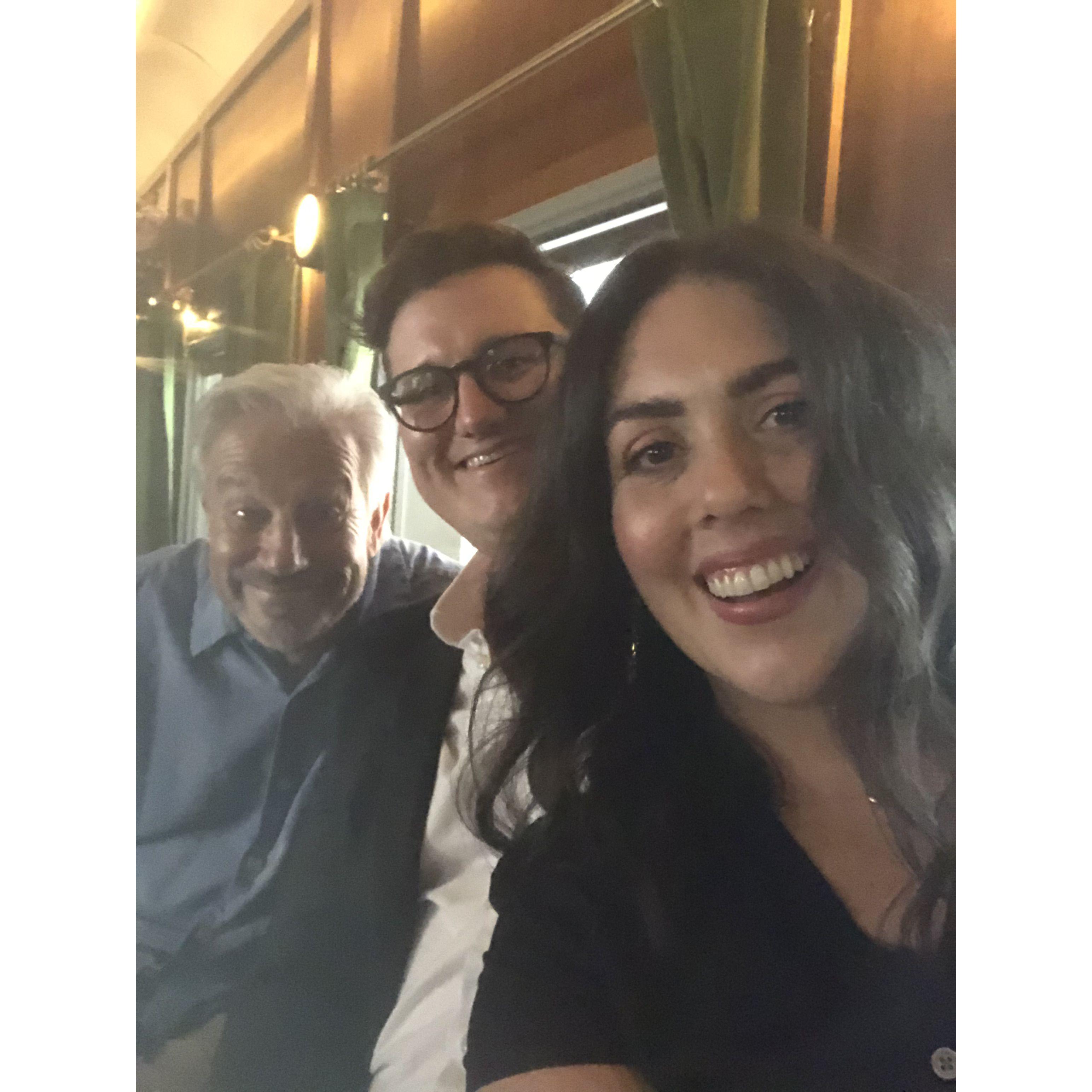 The father of the groom, Eddie, and us at our engagement dinner.