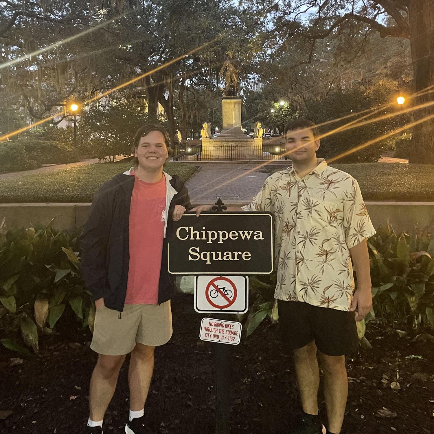Arizona and Tyler (groomsman) at Forrest Gump bench in Savannah, GA