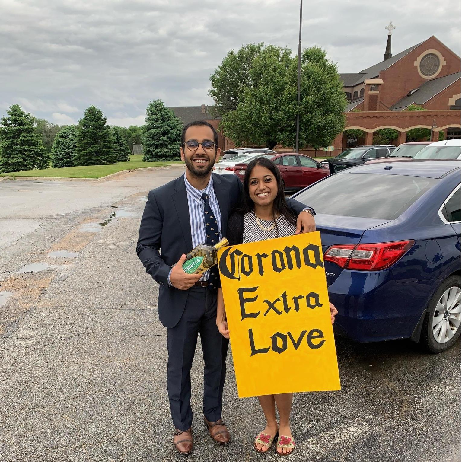 One of our first photos together as we waited outside the Church to greet our friends, Cody and Emily, on their wedding day in May 2020. The poster says it all!