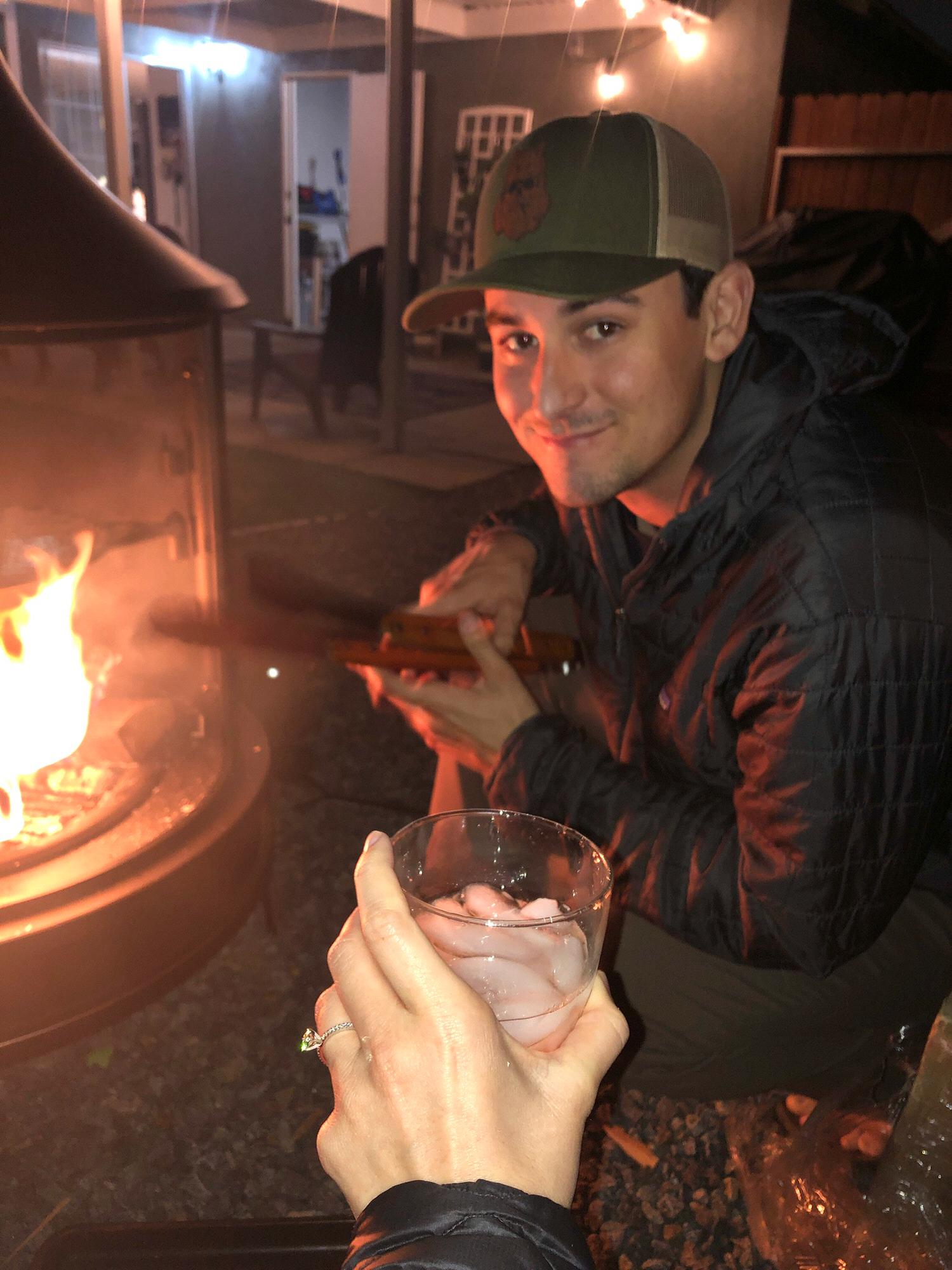 March 20th, 2020 He proposed on a quarantine date by the fire in our backyard <3