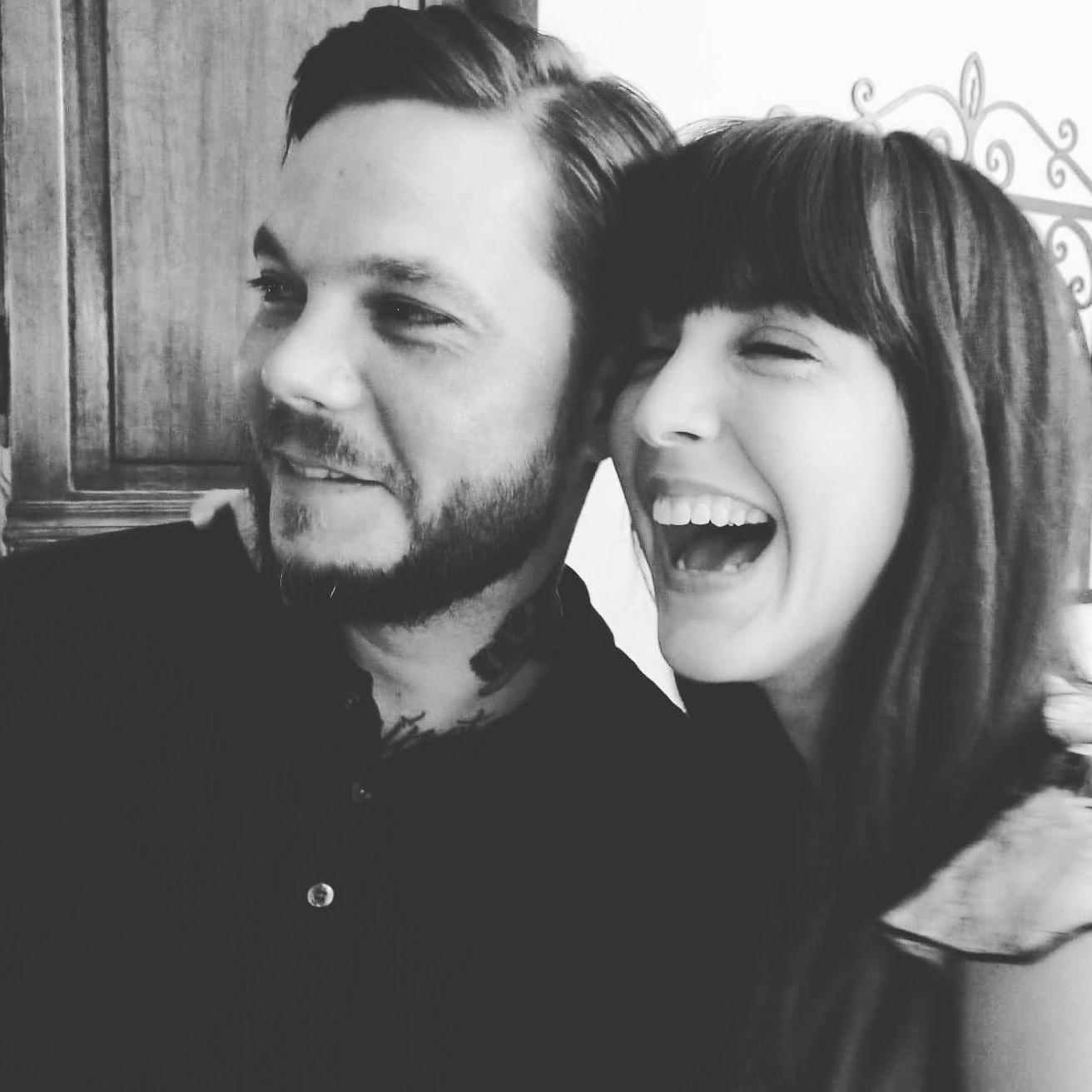 From our engagement party. In all honesty, I was probably laughing at one of my own jokes.