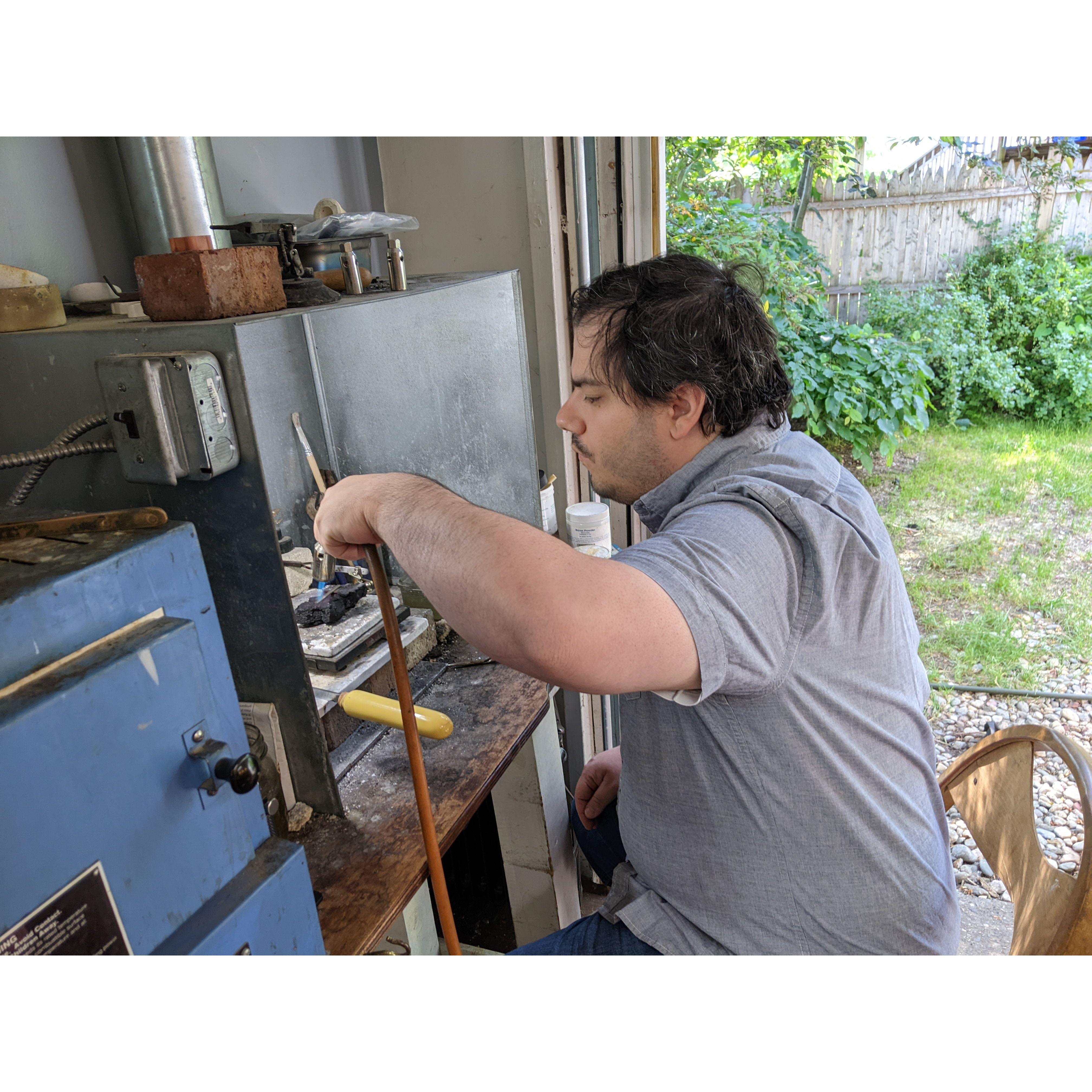 Chris soldering.