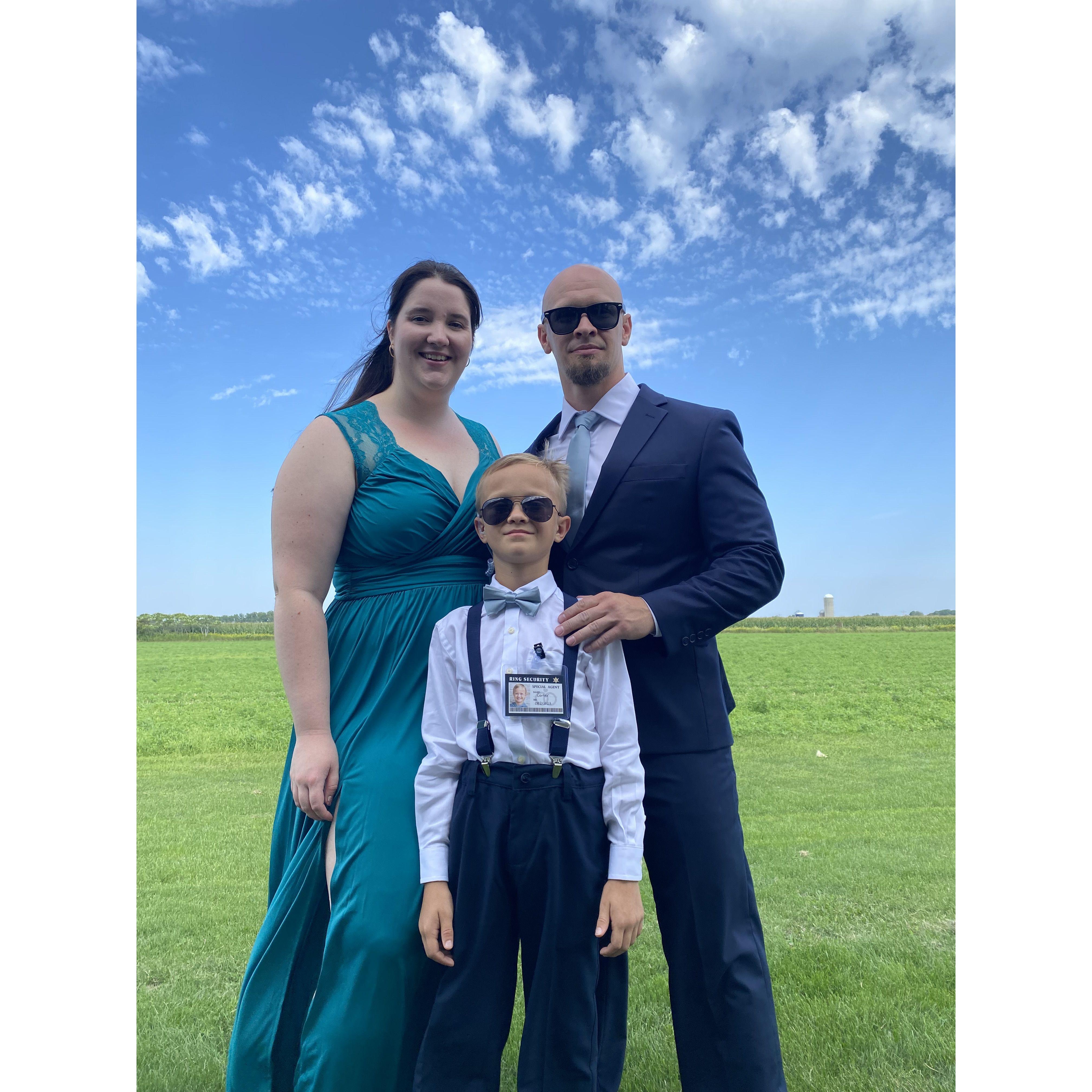 At a family wedding. John was the best man and Carter ring security. - August 2023