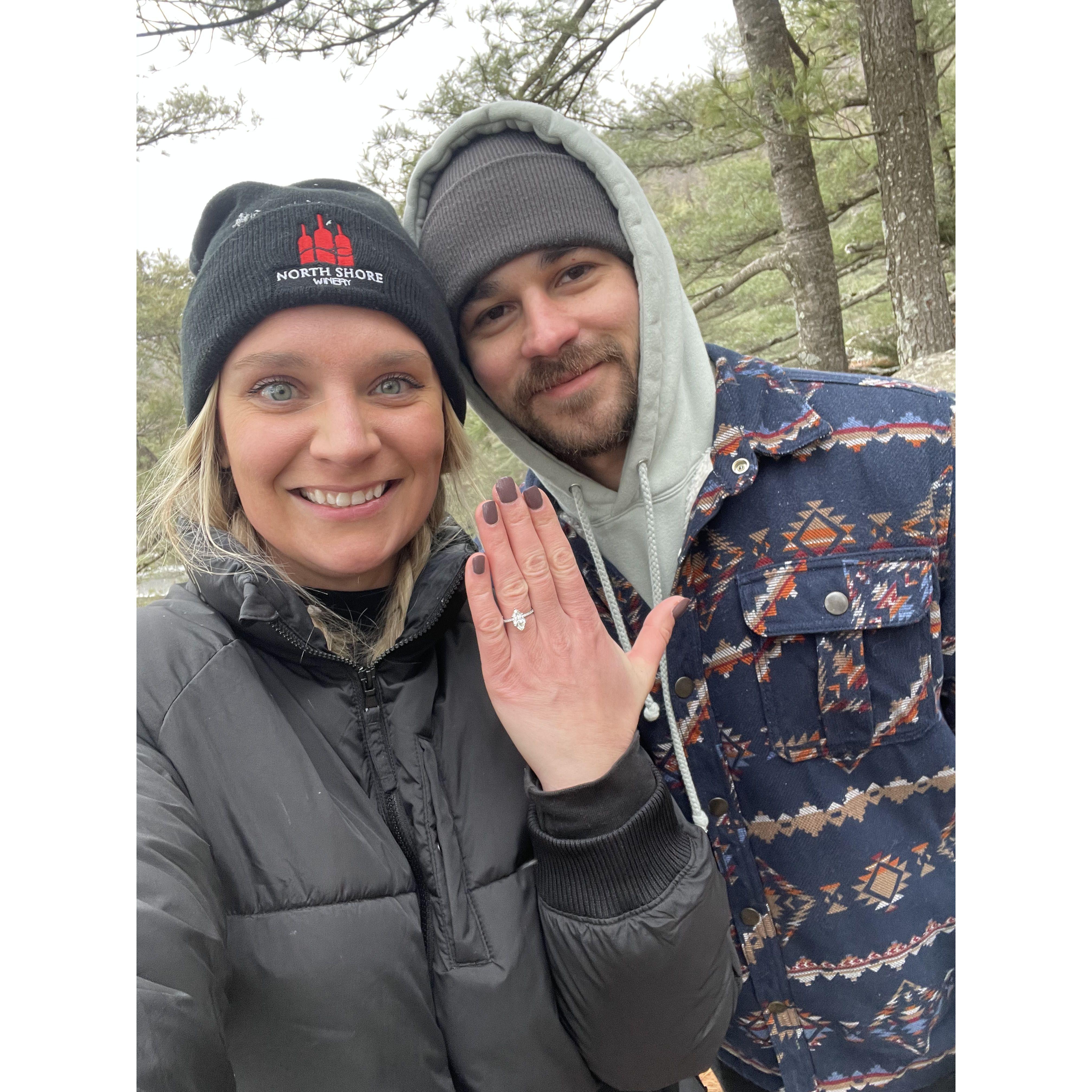 Our first photo together after the special engagement on New Year's Day 2025! Out for a hike with our doggies!
