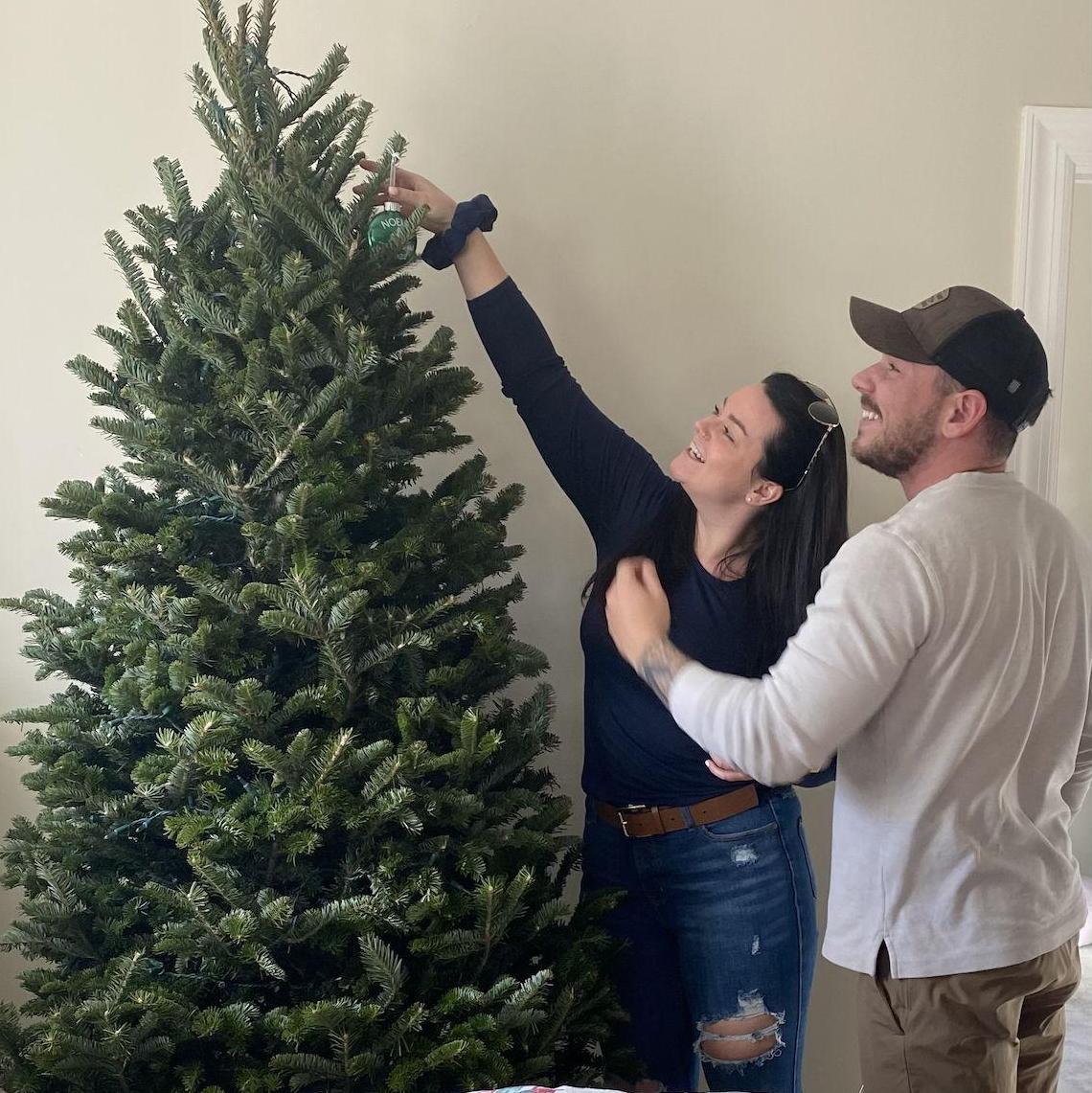 Our first Christmas Tree! (This was the year Troy bought Kerri a step stool for Christmas)