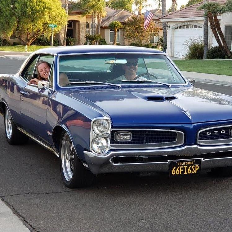 Sam and Abbi cruising in DCC's '66 GTO