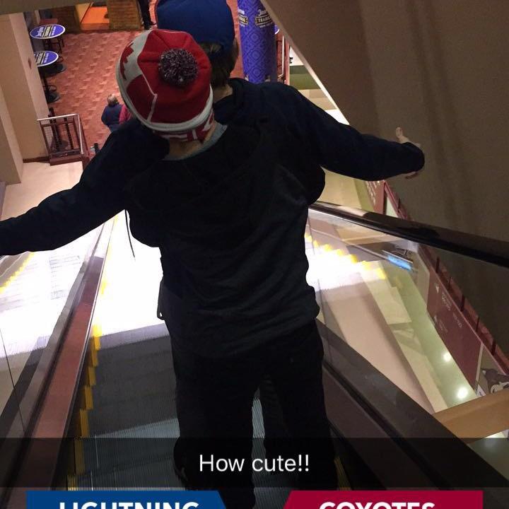 Coyotes Game Titanic Moment with Ricky holding Mason
