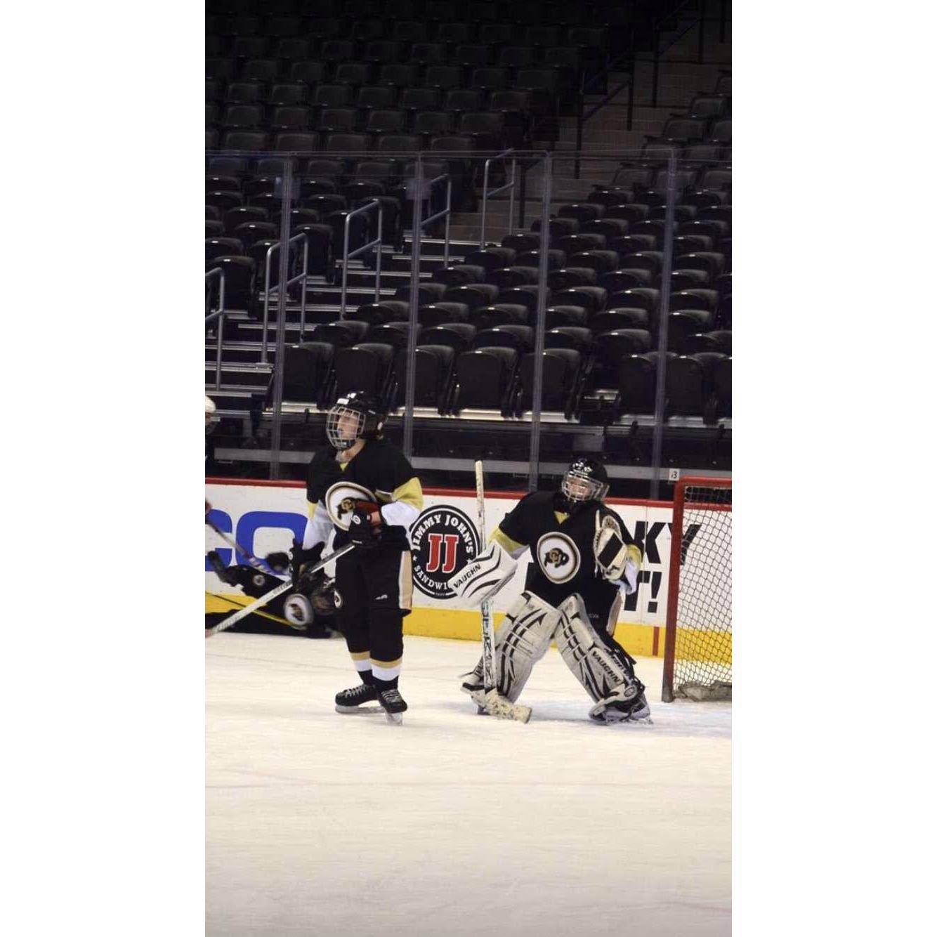Our first official photo together when we both played Junior Buffs hockey. Thank you Steph for unknowingly capturing this special photo for us! Yes Caleb does still stand in front of me to this day.