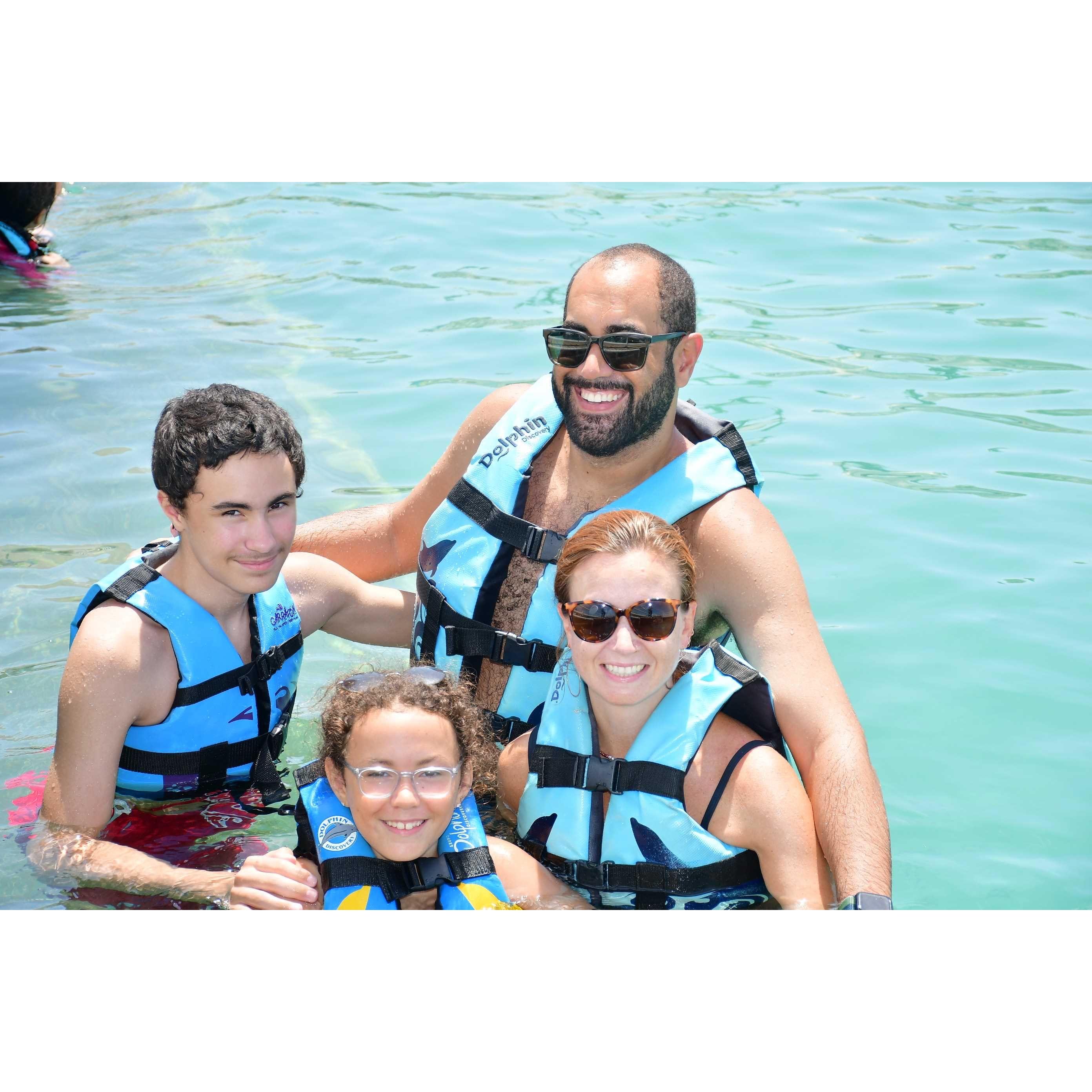 Riding the high from having just touched a dolphin in Mexico. Also we just look really good in life vests.