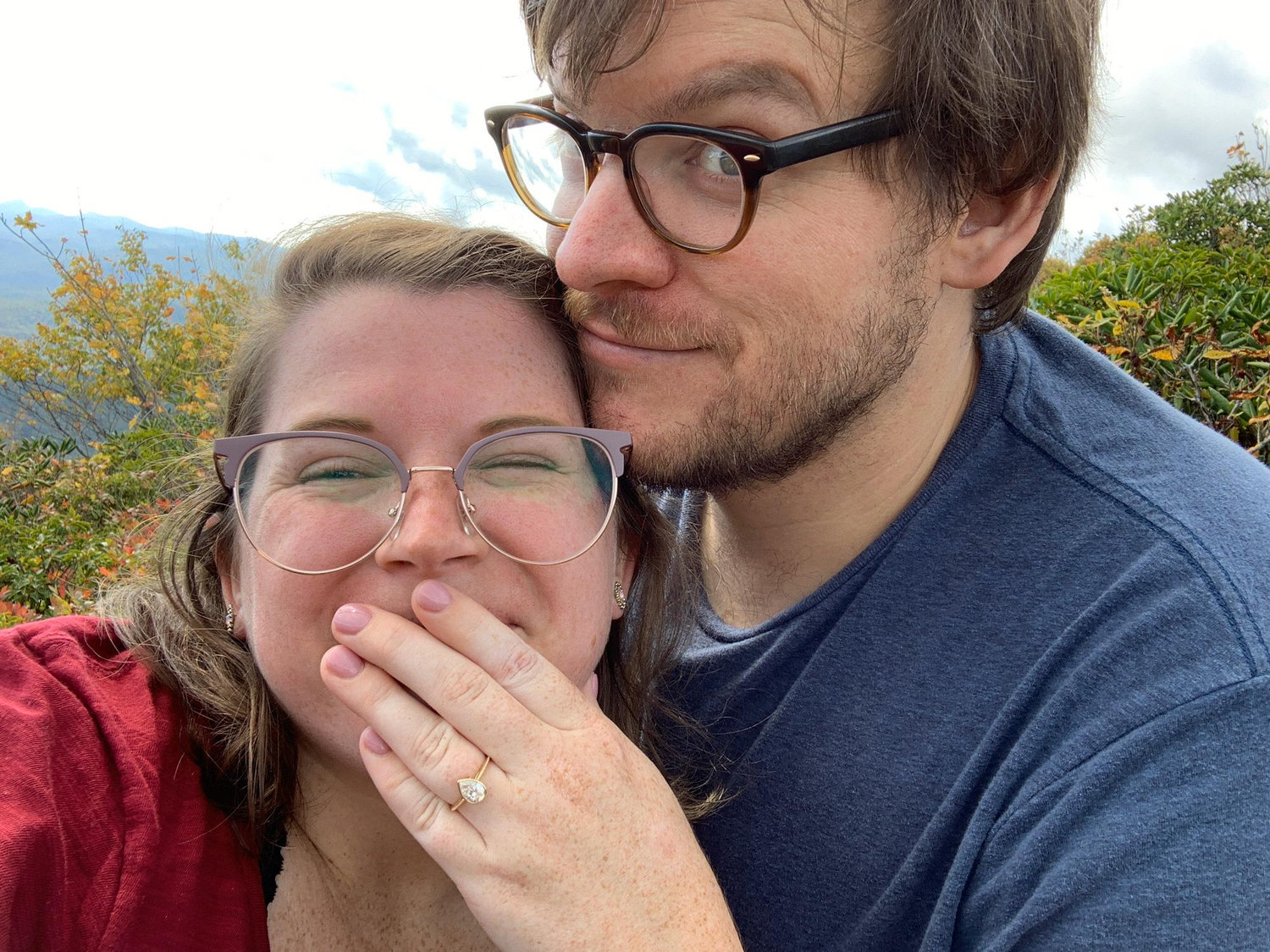 The moment he proposed! Kaylee is sweaty from the treacherous hike.